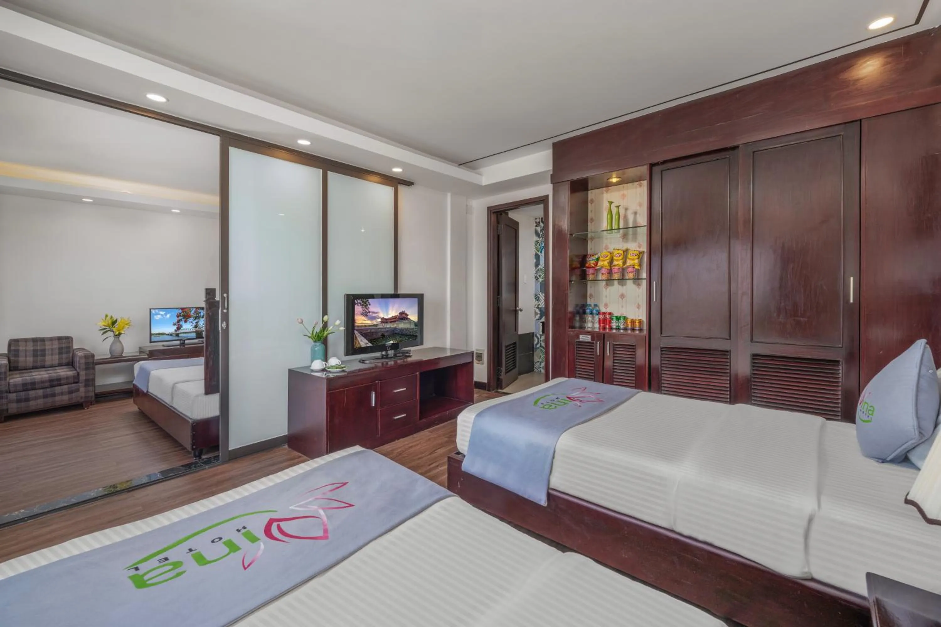 Communal lounge/ TV room, Bed in Vina Spa Hotel
