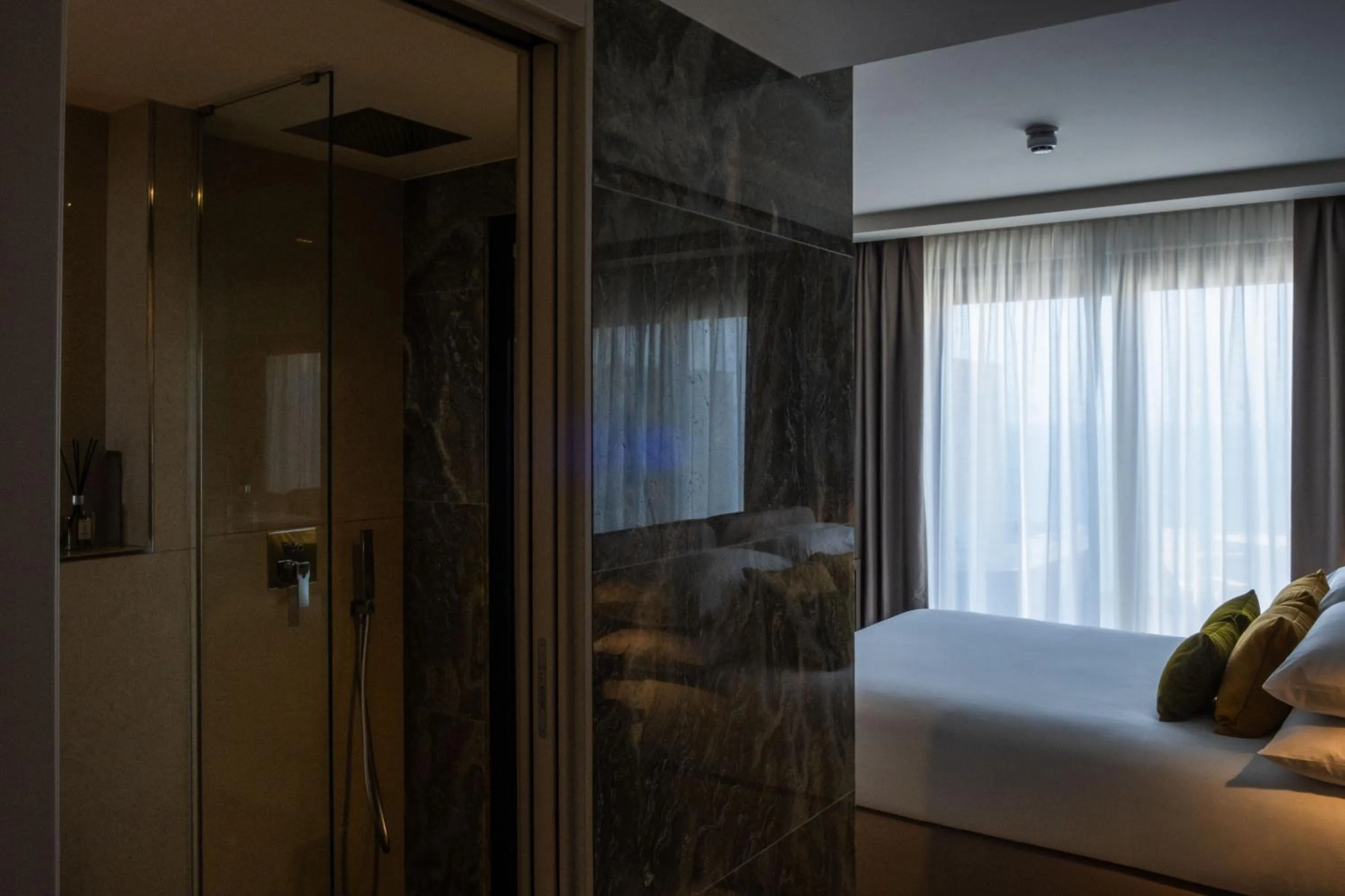 Bed in Deep Blu Boutique Hotel