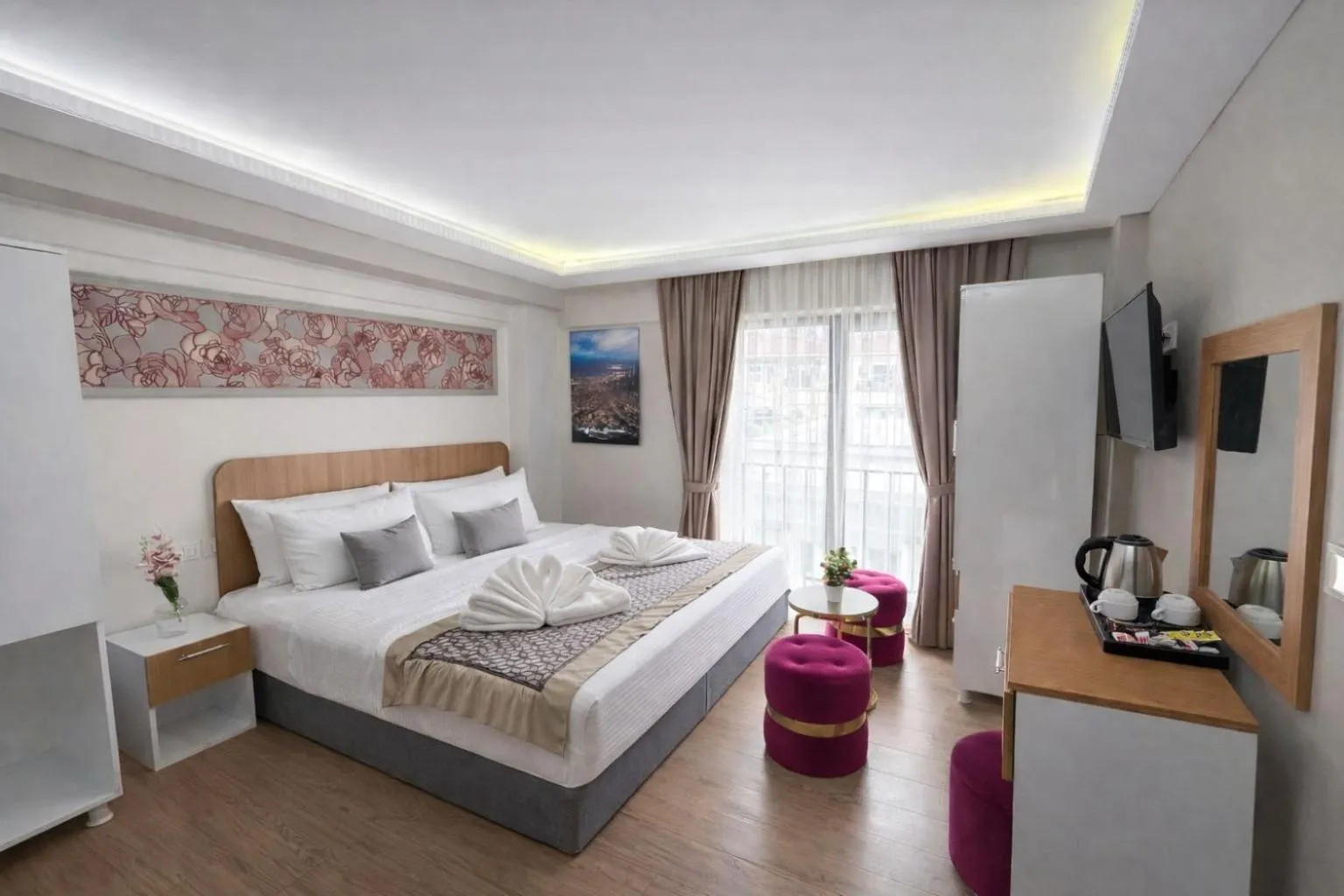 Bed in Ria Suites Boutique Hotel