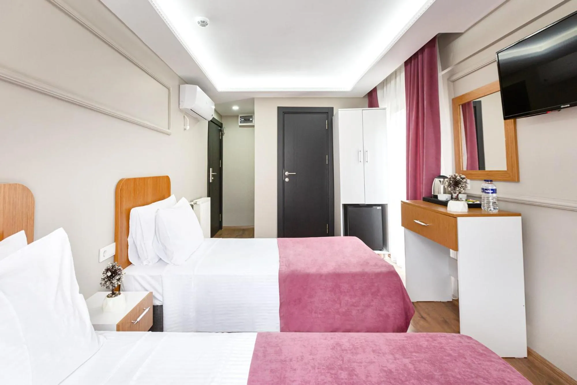 Photo of the whole room, Bed in Ria Suites Boutique Hotel