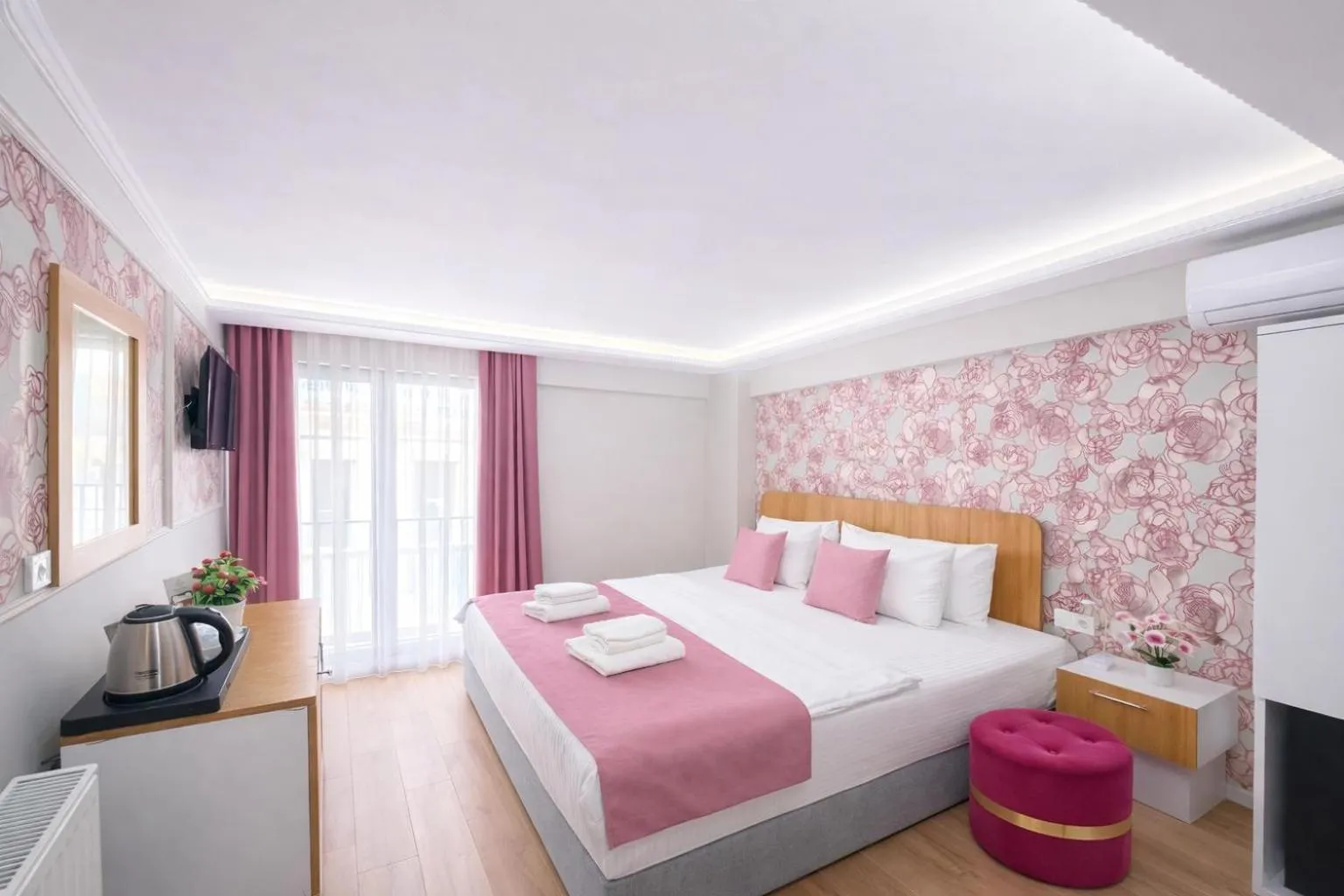 Bed in Ria Suites Boutique Hotel