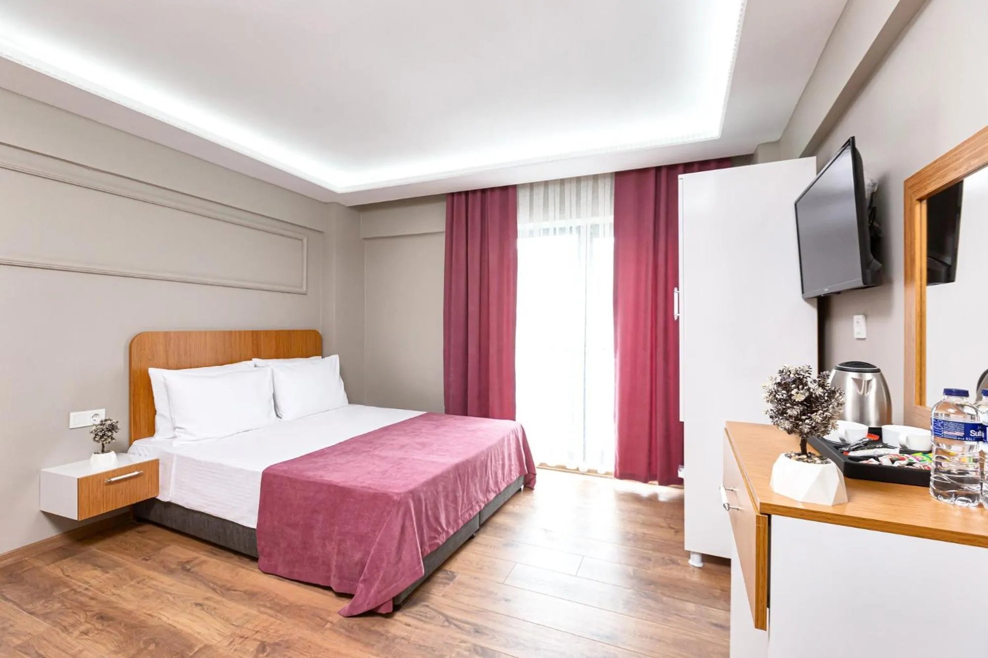 Photo of the whole room, Bed in Ria Suites Boutique Hotel