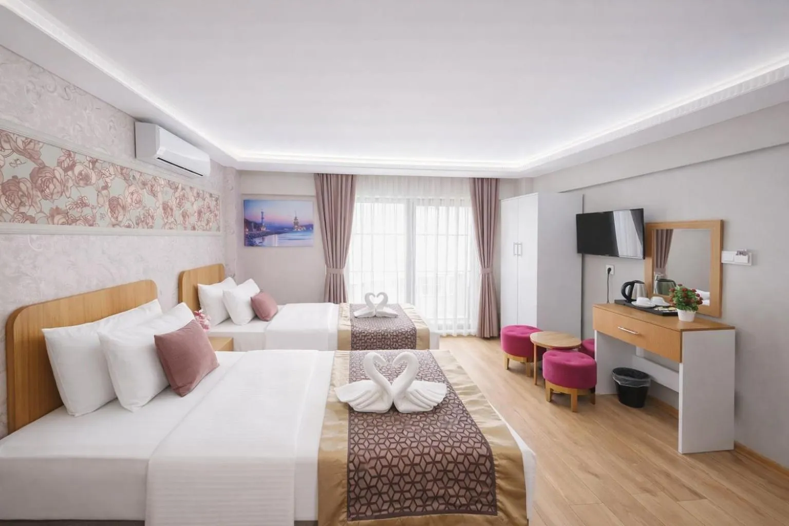 Bed in Ria Suites Boutique Hotel