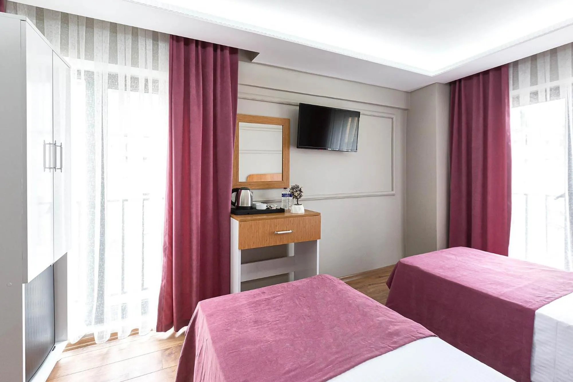 Photo of the whole room, Bed in Ria Suites Boutique Hotel