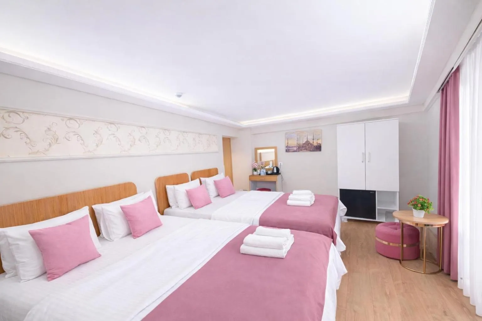 Bed in Ria Suites Boutique Hotel