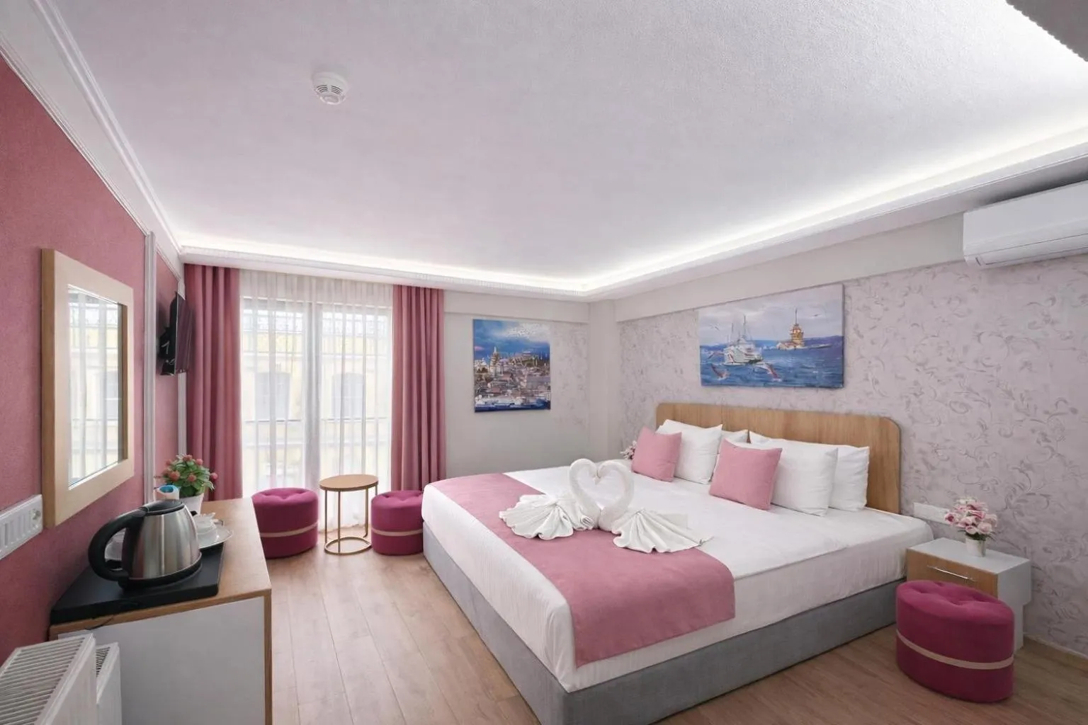 Bed in Ria Suites Boutique Hotel