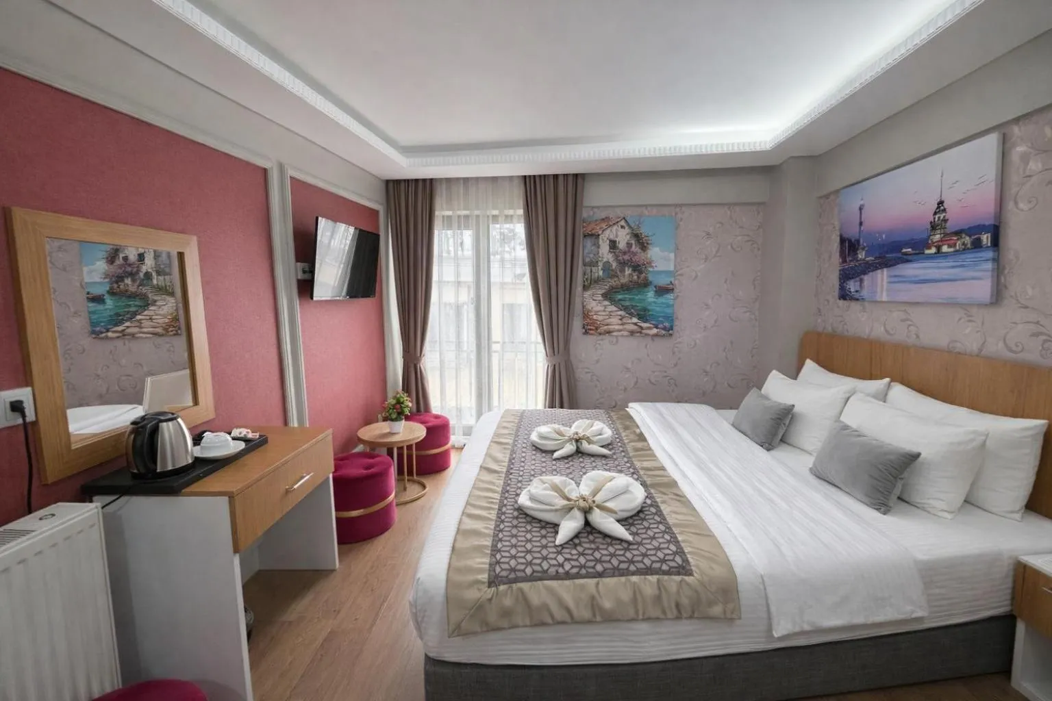 Bed in Ria Suites Boutique Hotel