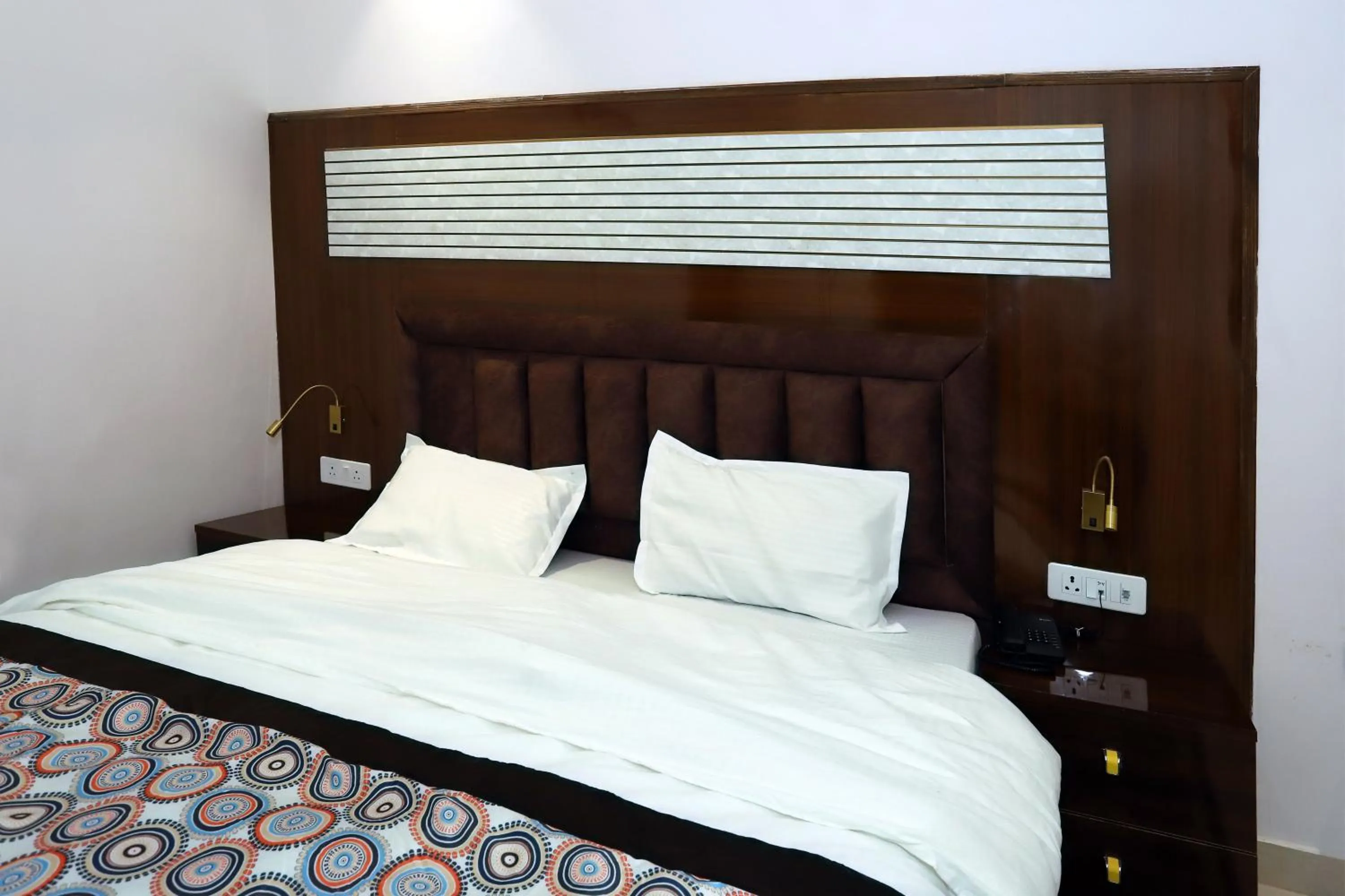 Bed in VRINDAVAN GUEST HOUSE