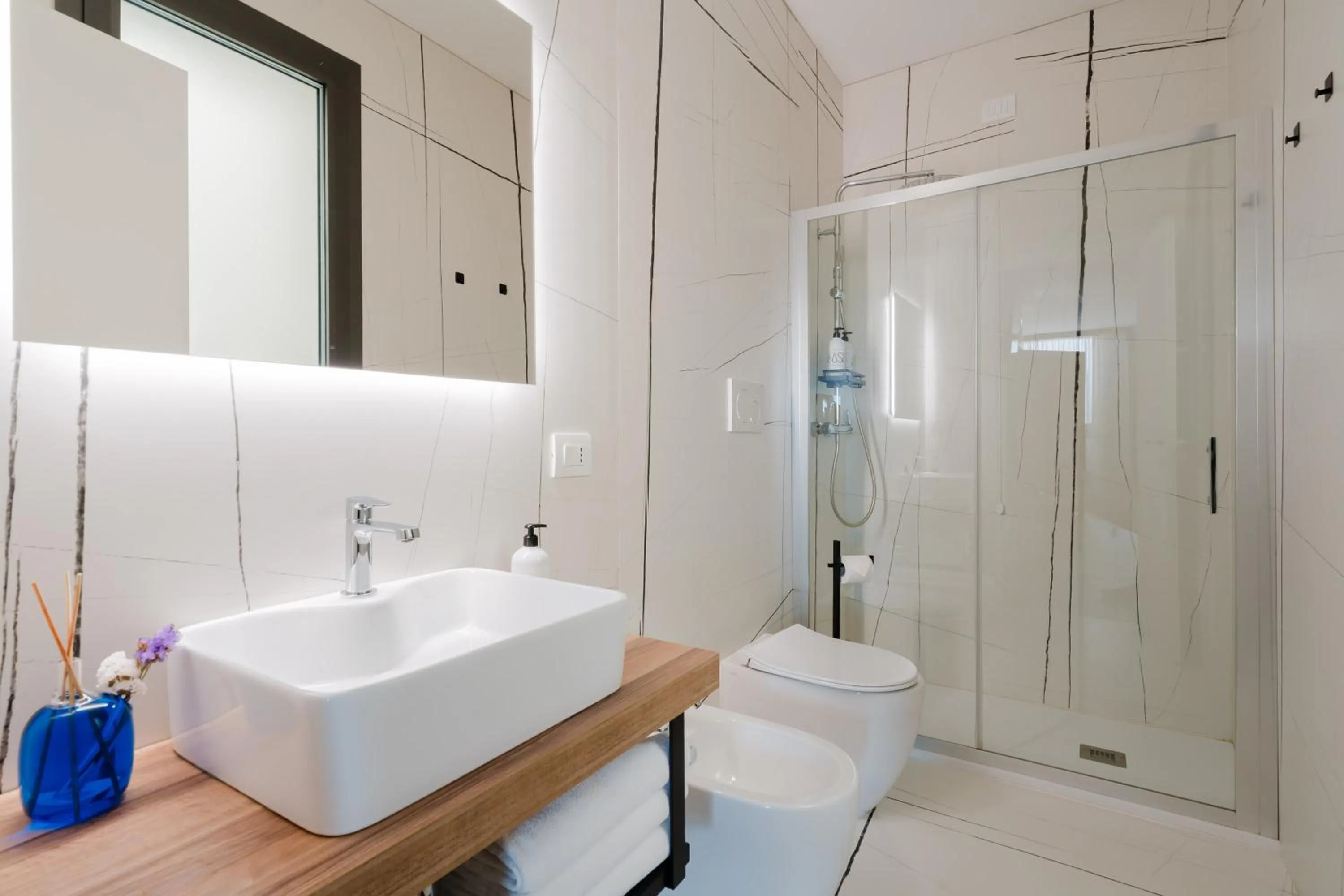 Bathroom in Glass House - Smart Rooms & Parking