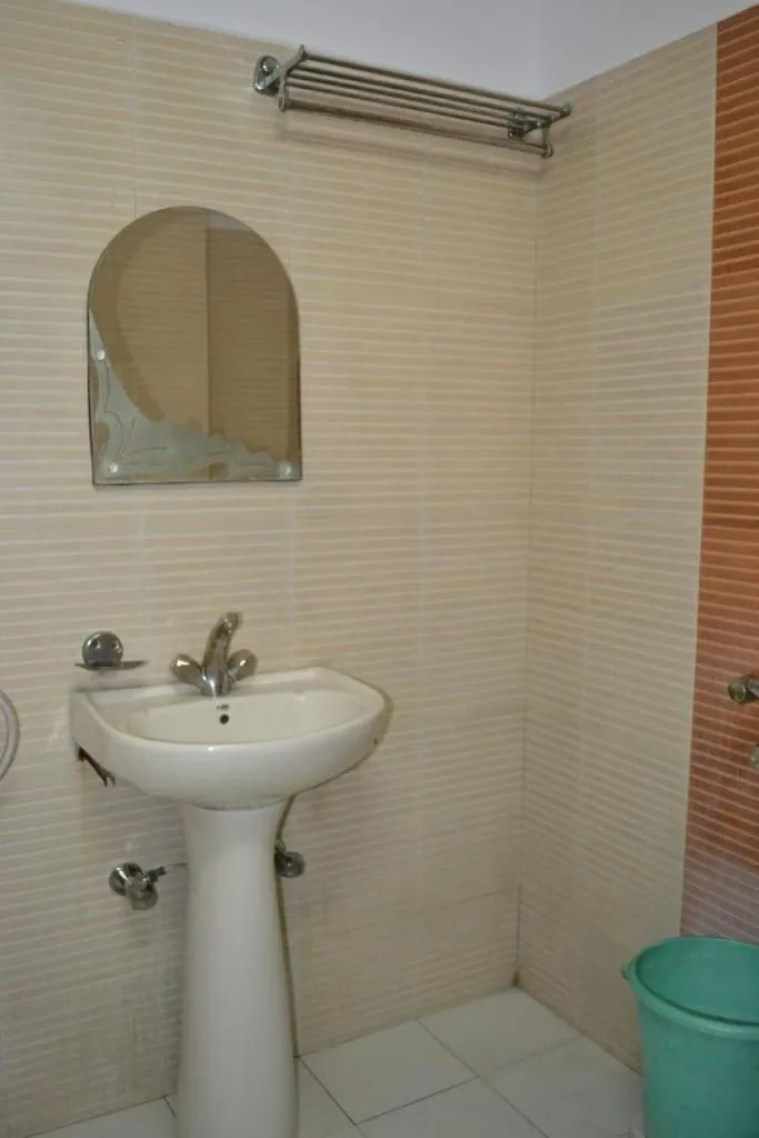 Bathroom in Hotel Jigyasa By Mayda Hospitality Pvt. Ltd.
