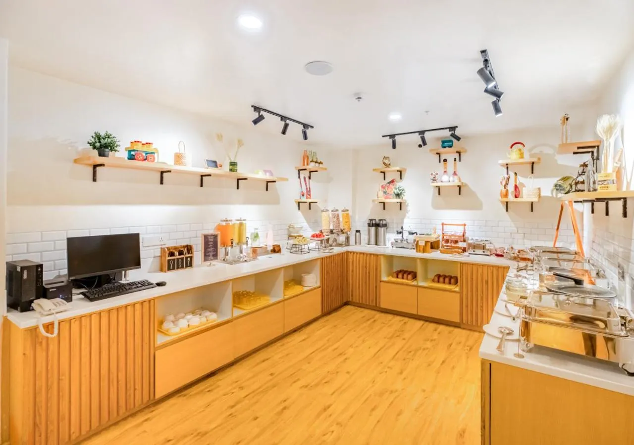 Kitchen or kitchenette in Bloom Hotel - HSR Layout Sector 6