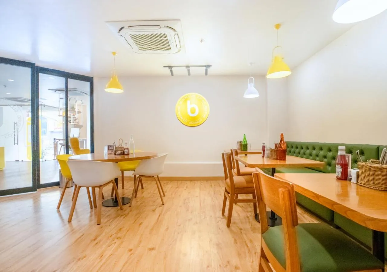Dining area in Bloom Hotel - HSR Layout Sector 6