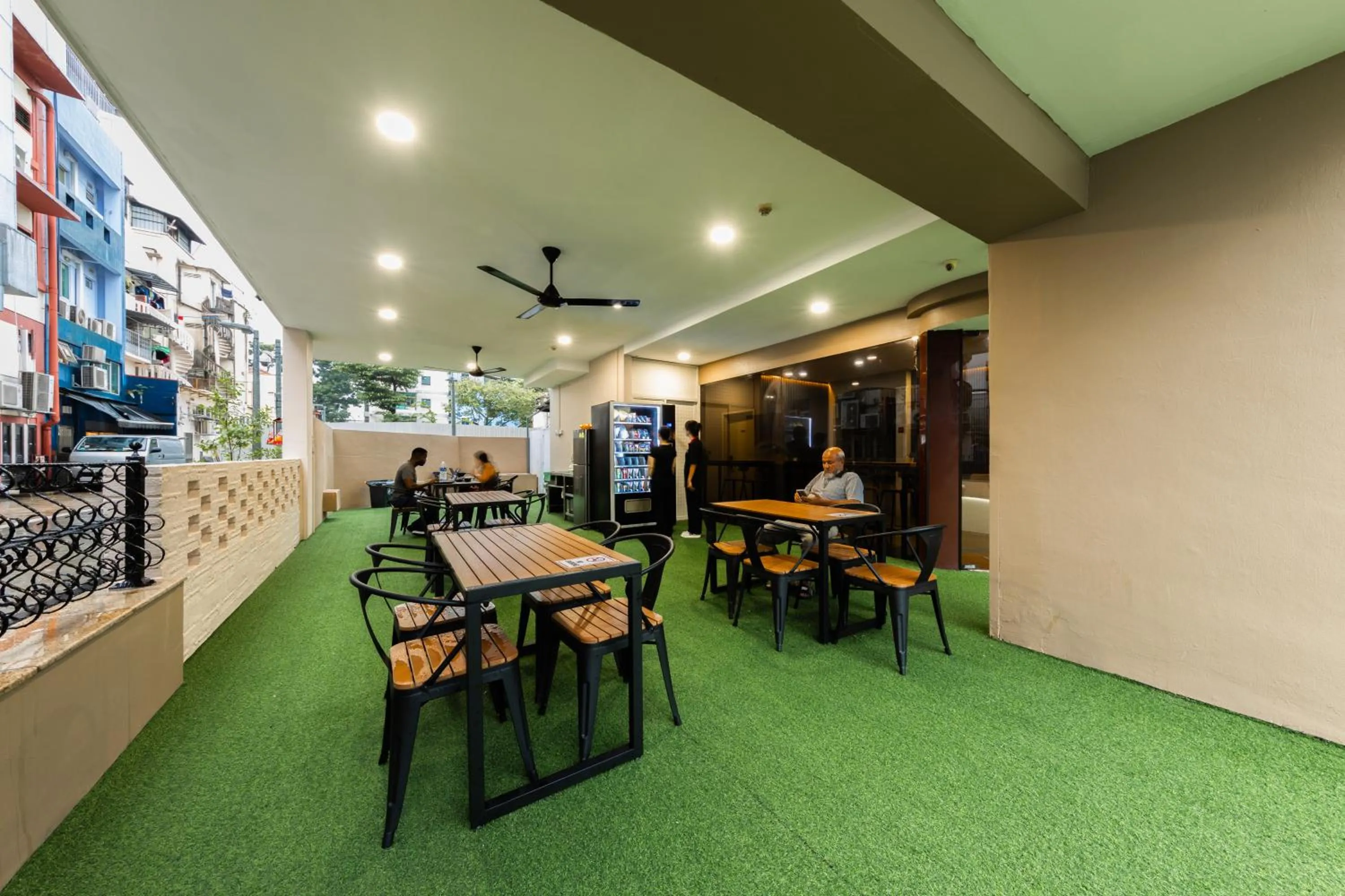 Communal lounge/ TV room in D'Nova Hotel Kallang