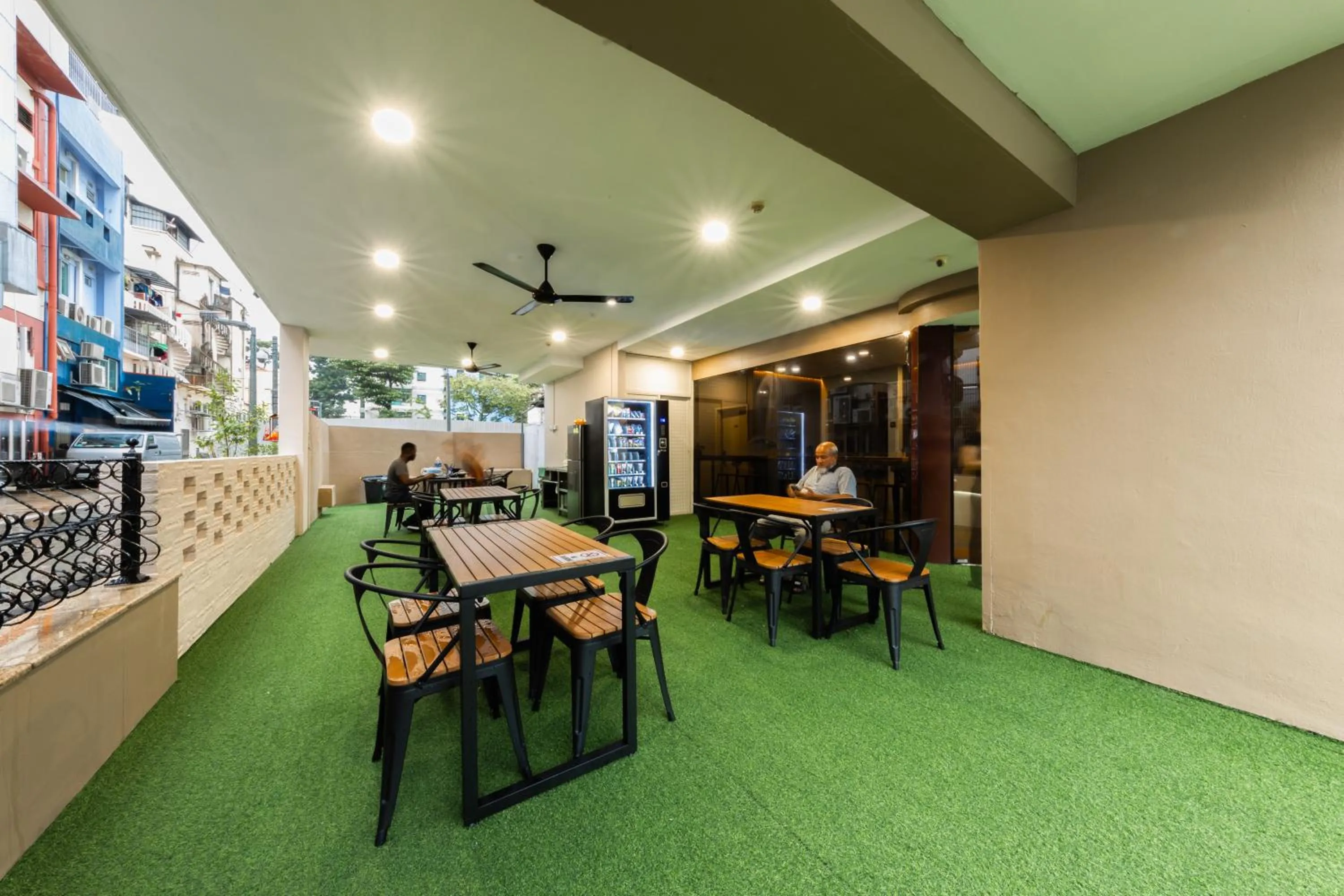 Communal lounge/ TV room in D'Nova Hotel Kallang