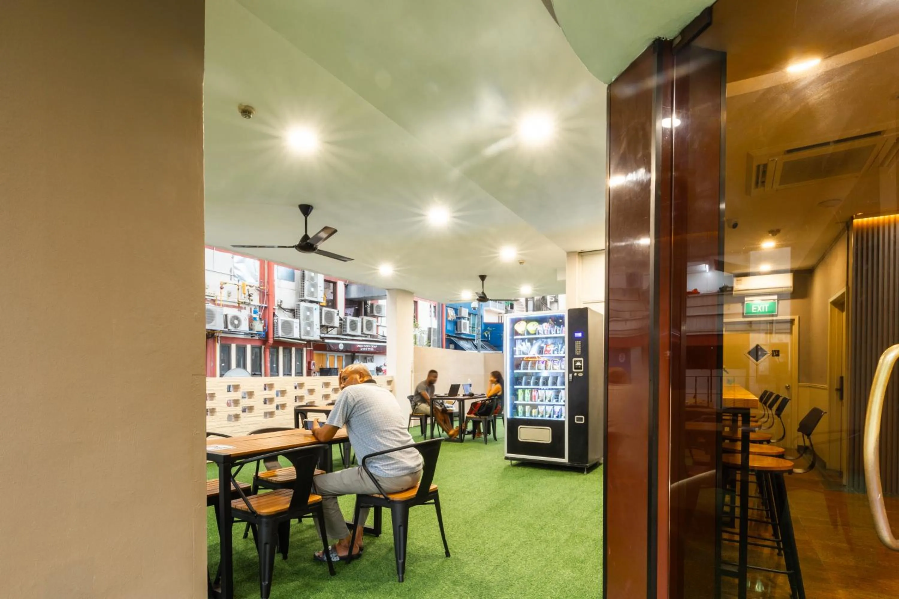 Communal lounge/ TV room in D'Nova Hotel Kallang