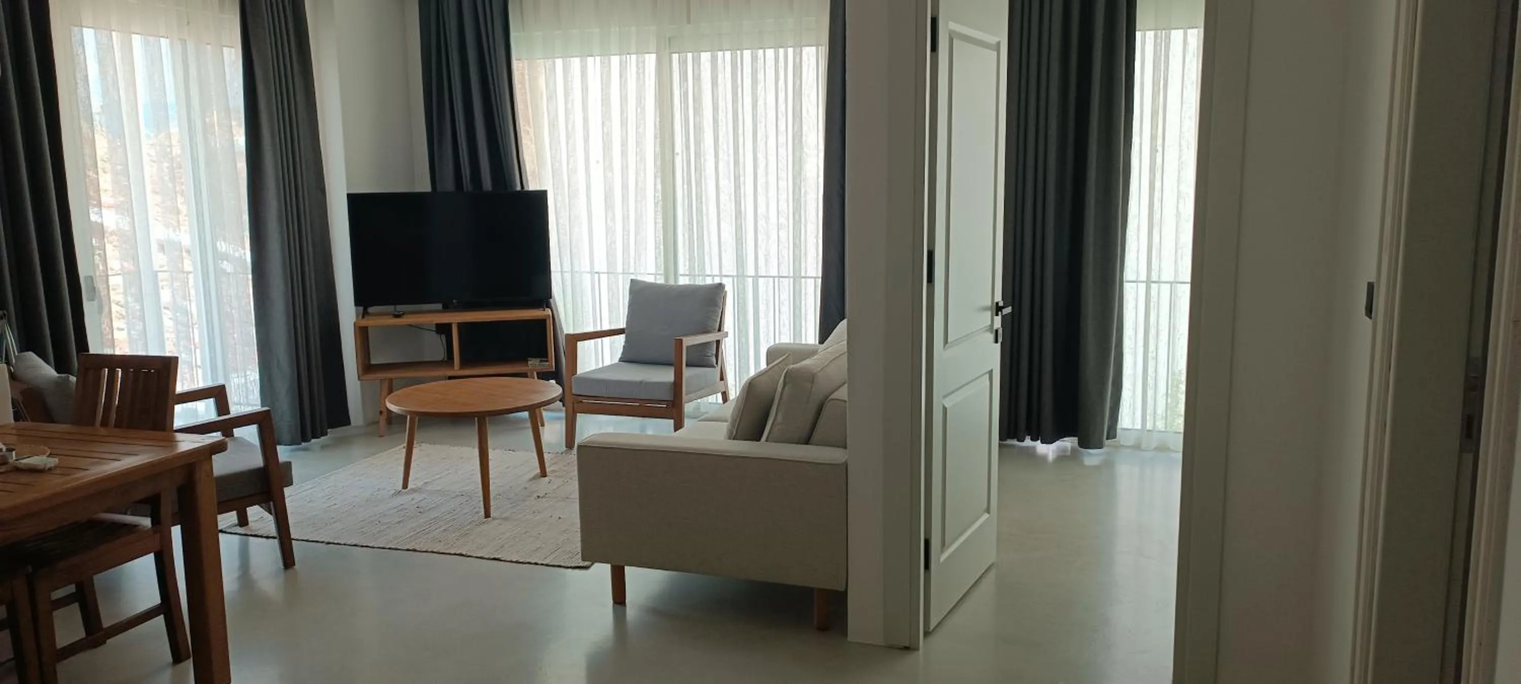 Communal lounge/ TV room in Gizz Suites City