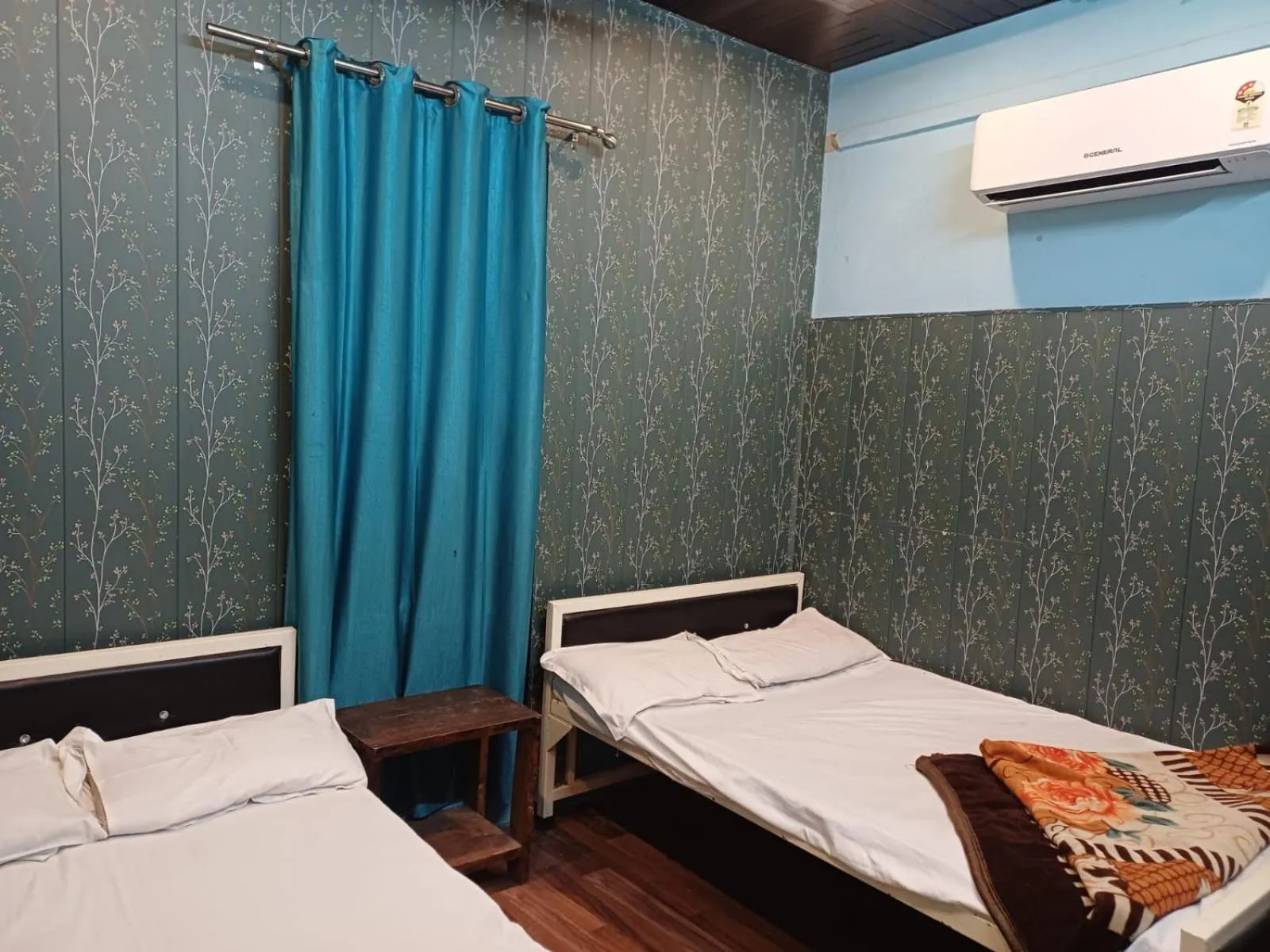 Bed in Maa Tara AC Home Stay