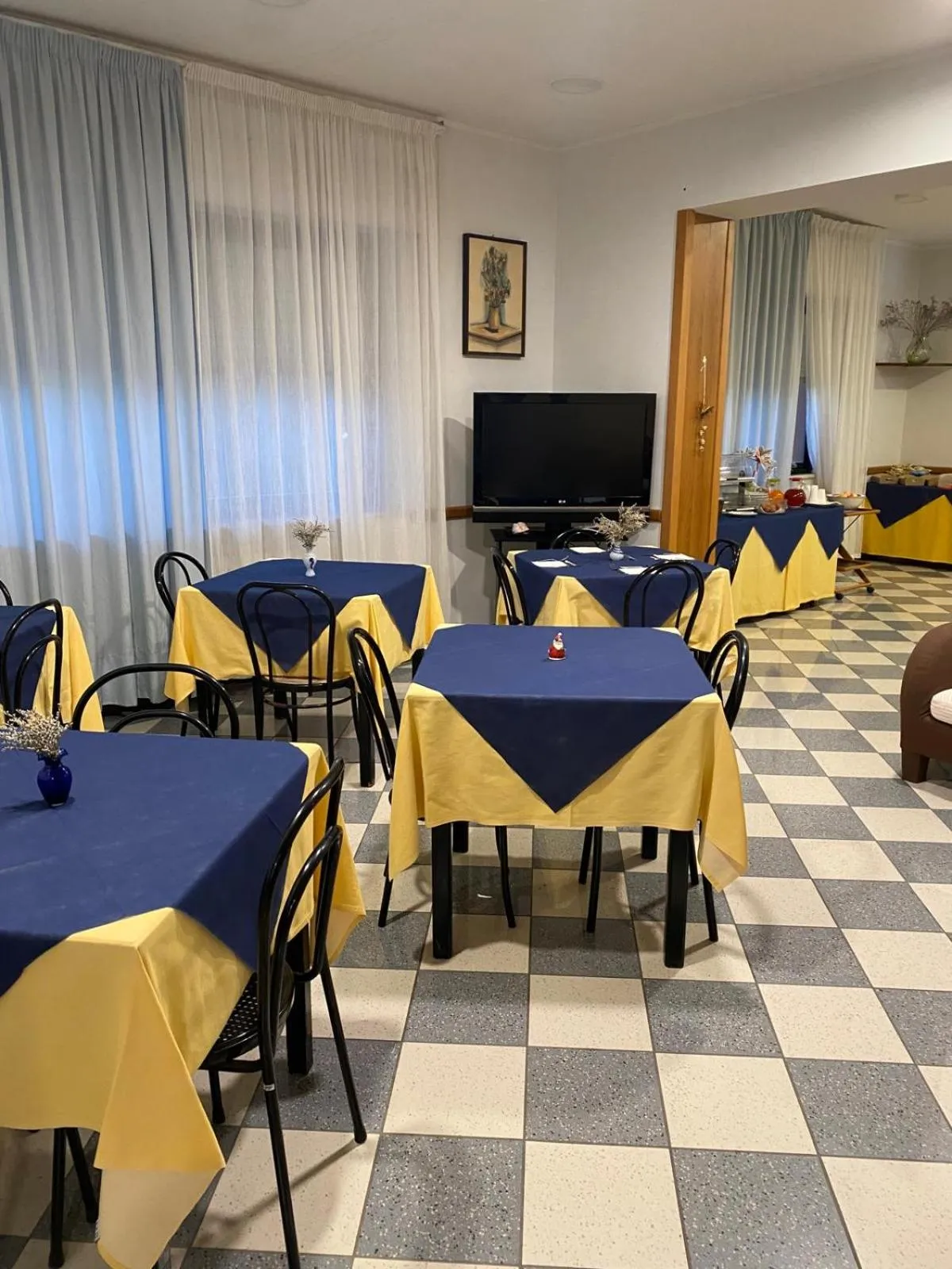 Communal lounge/ TV room in Hotel Ferrara