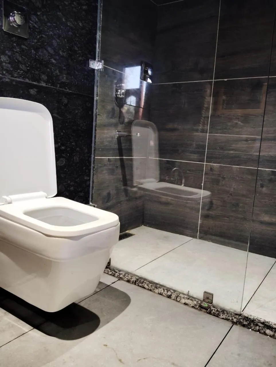 Bathroom in Hotel CM Palace - Pure Vegetarian