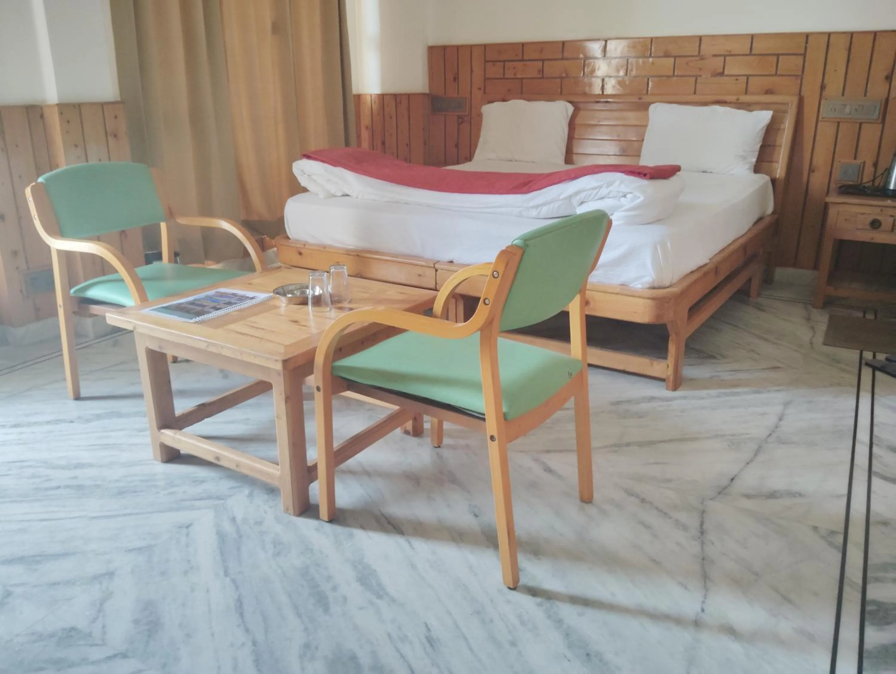 Bed in Hotel CM Palace - Pure Vegetarian