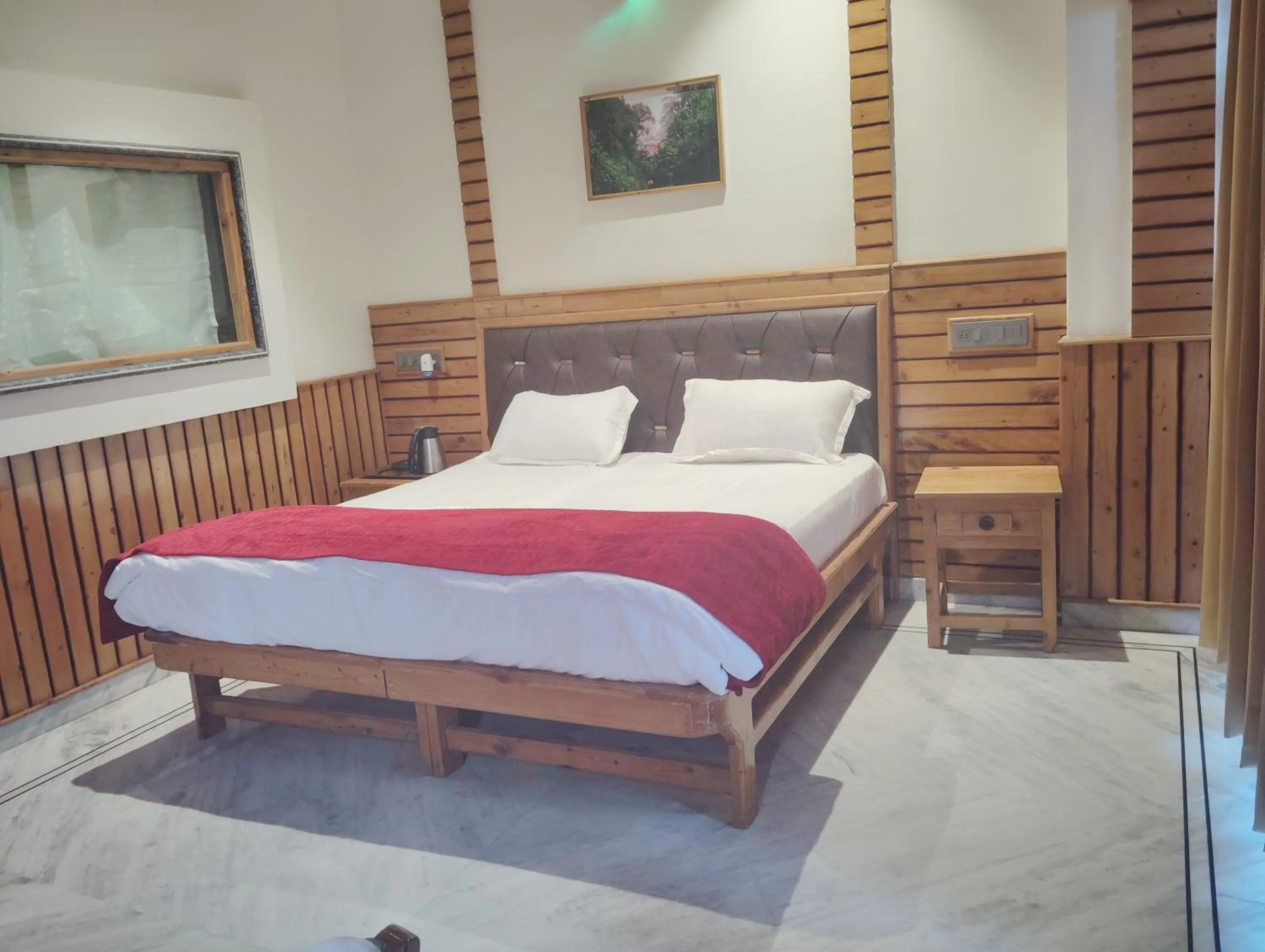 Bedroom, Bed in Hotel CM Palace - Pure Vegetarian