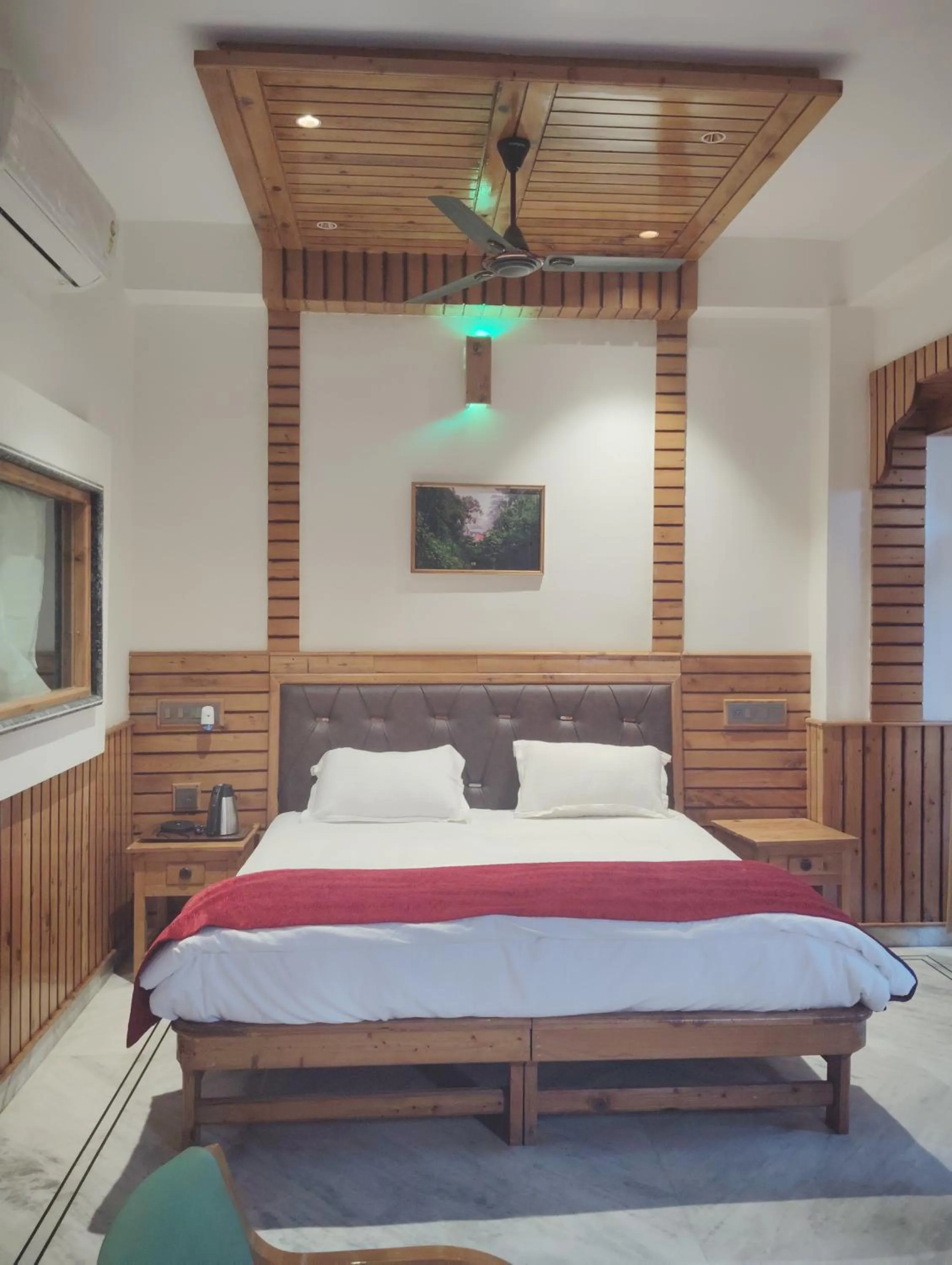 Bedroom, Bed in Hotel CM Palace - Pure Vegetarian