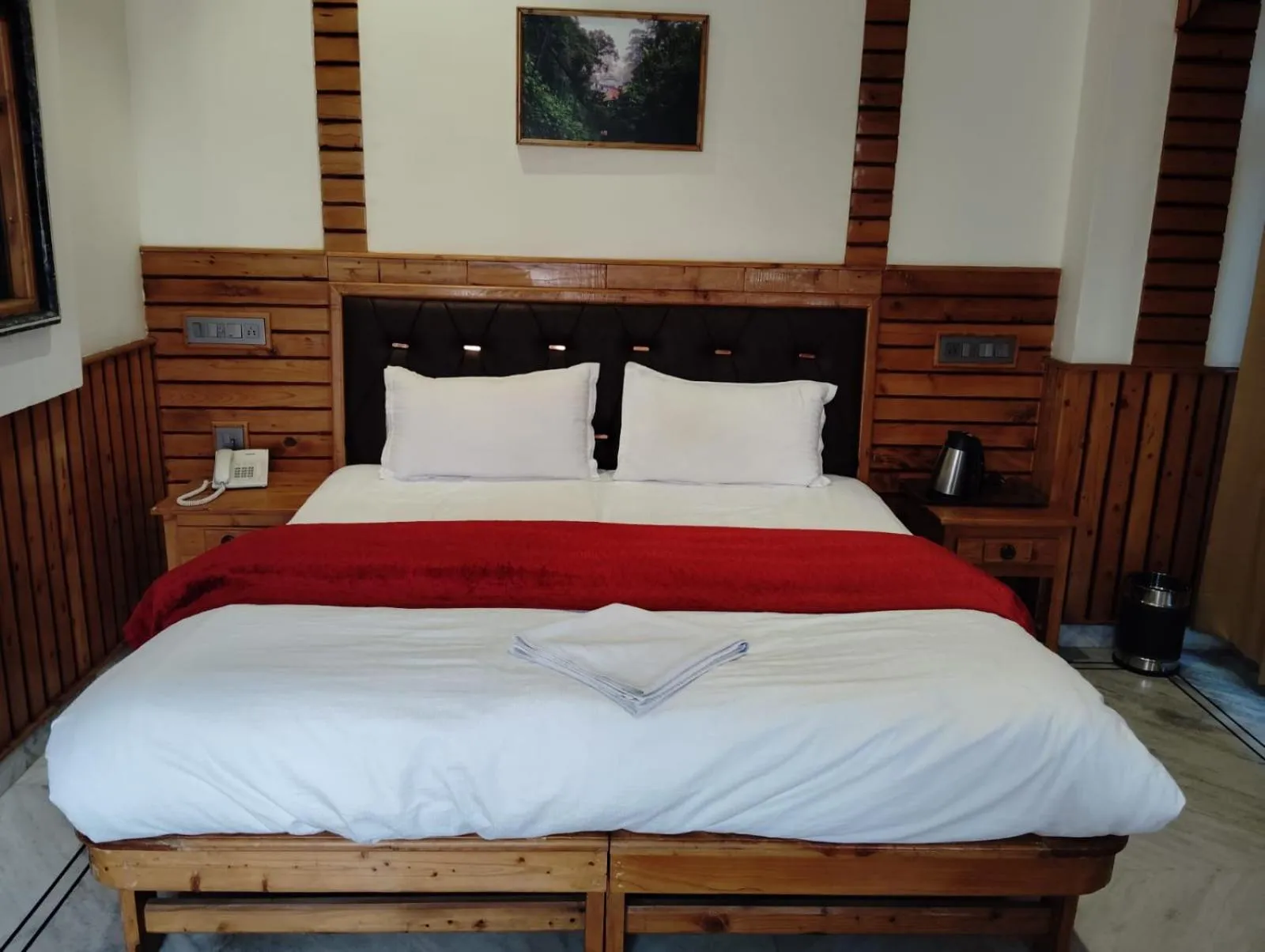 Bed in Hotel CM Palace - Pure Vegetarian