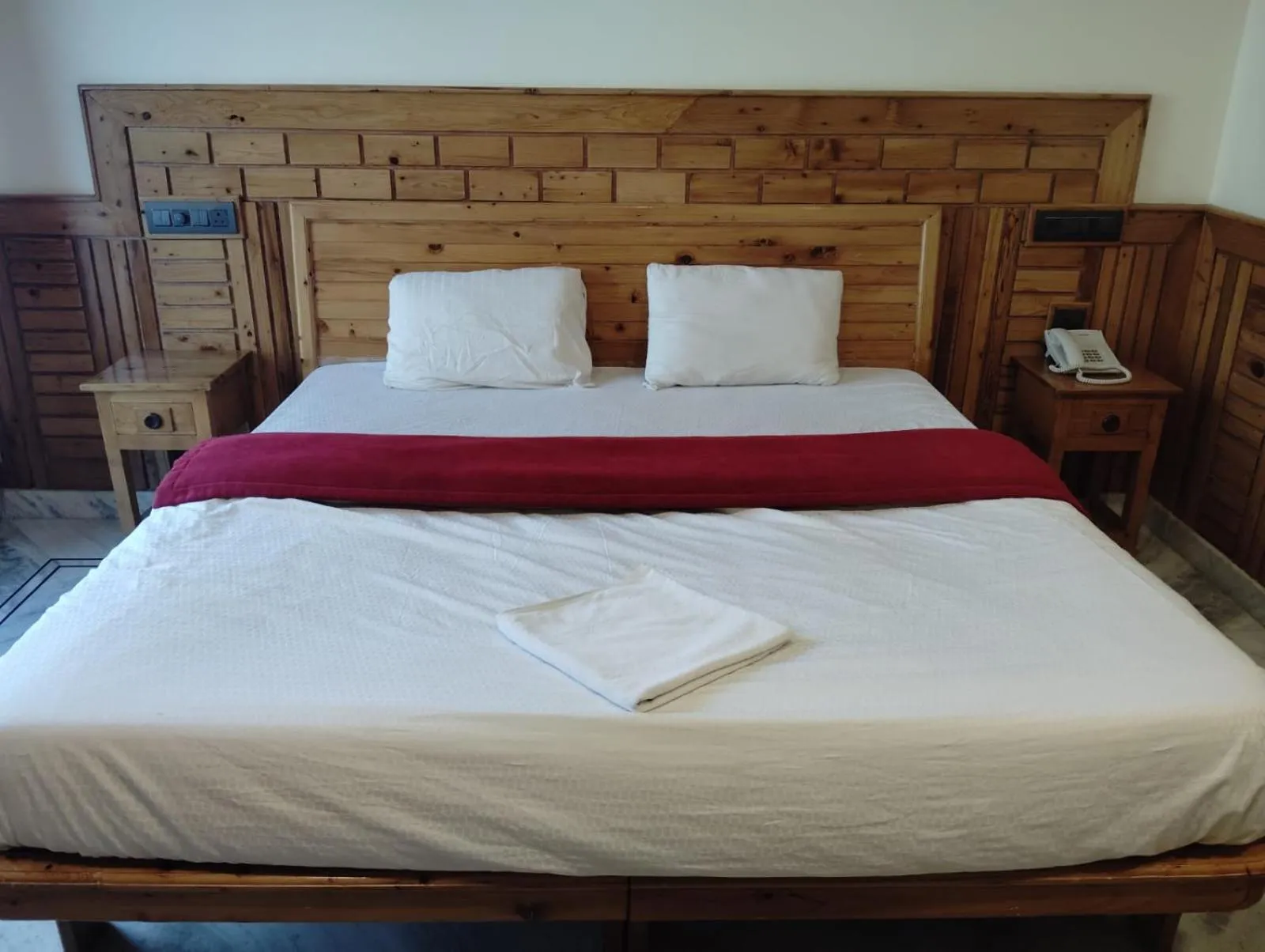 Bed in Hotel CM Palace - Pure Vegetarian