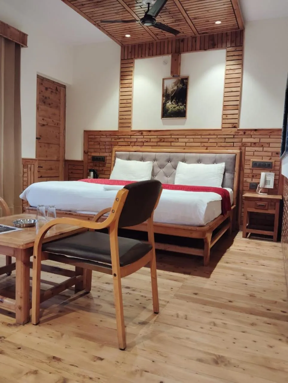 Bedroom in Hotel CM Palace - Pure Vegetarian