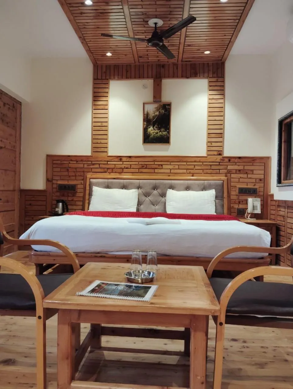 Bedroom in Hotel CM Palace - Pure Vegetarian