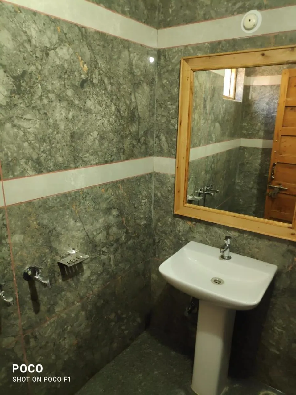 Bathroom in Hotel CM Palace - Pure Vegetarian