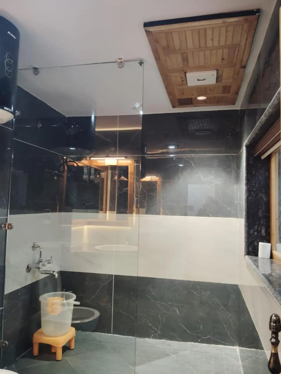 Bathroom in Hotel CM Palace - Pure Vegetarian