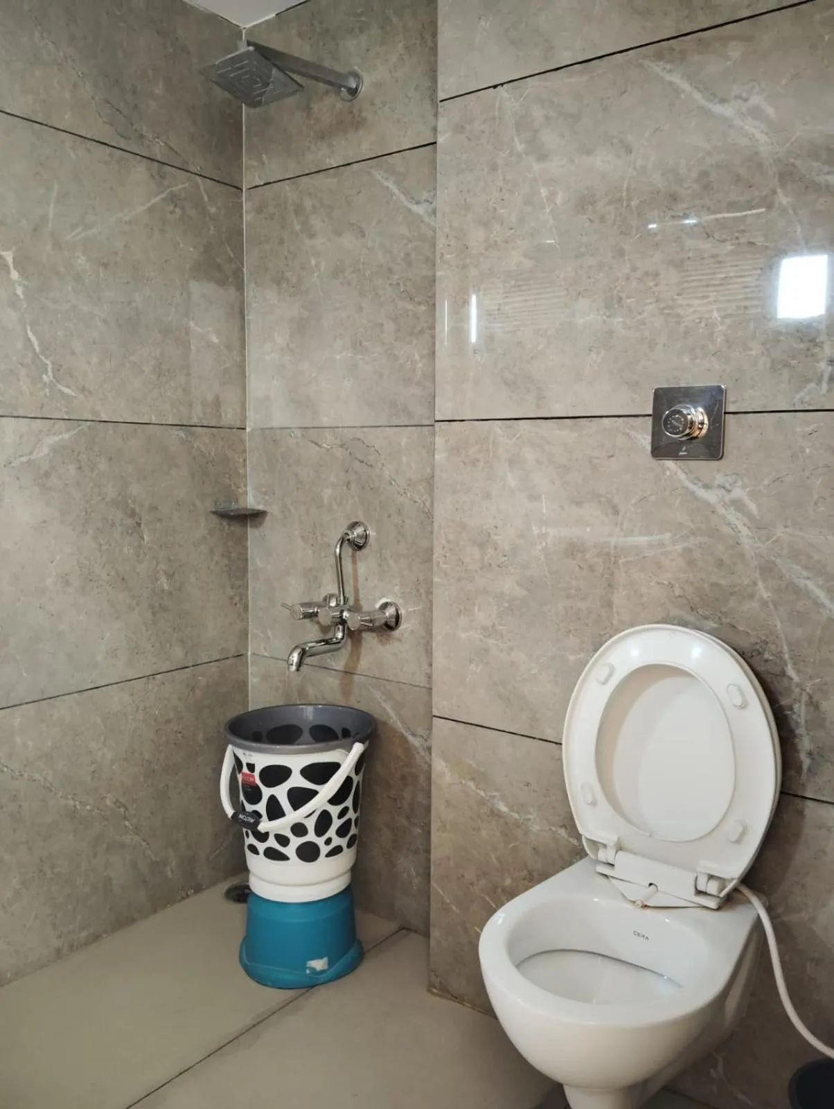 Shower in Hotel CM Palace - Pure Vegetarian