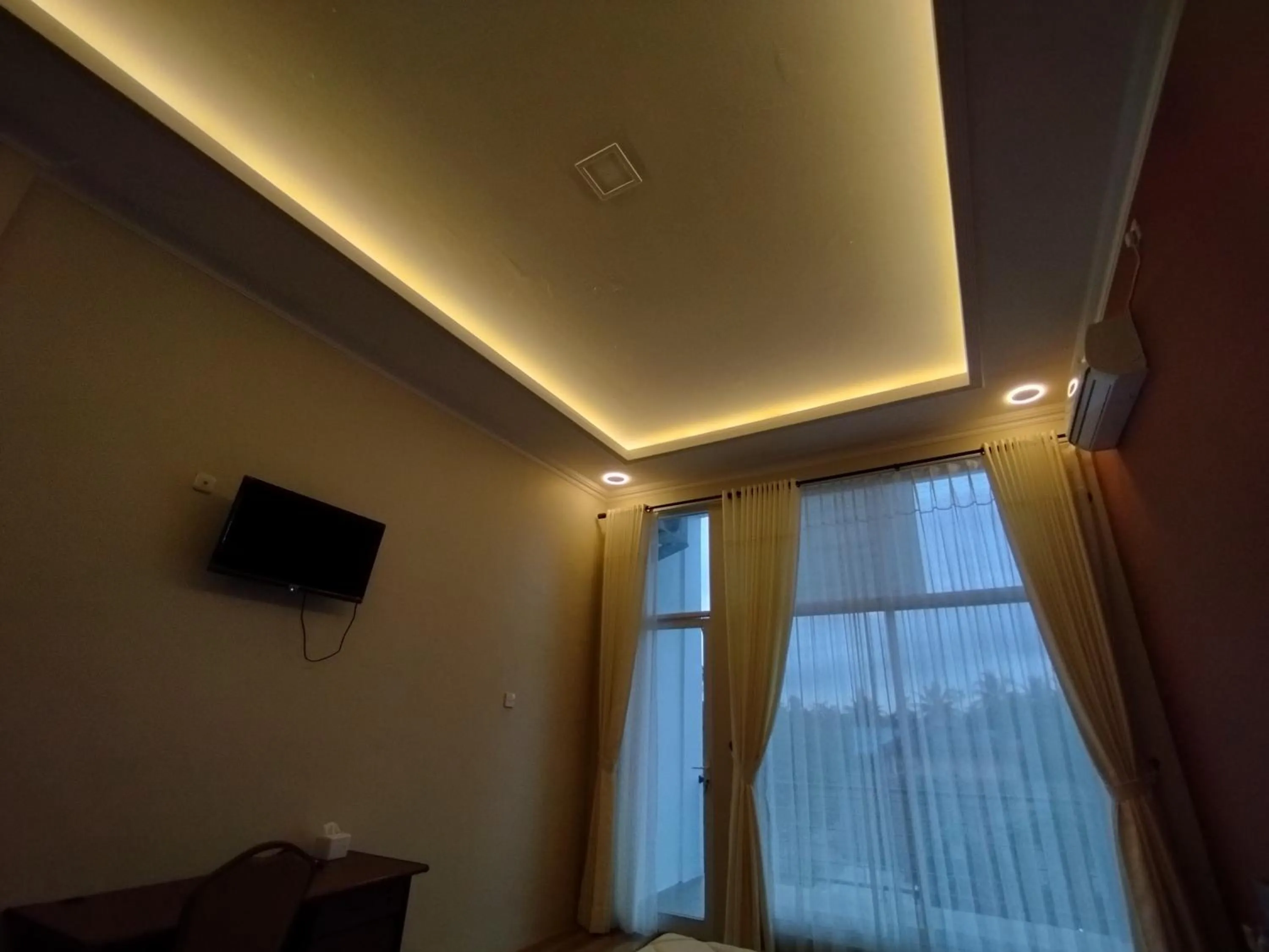 Communal lounge/ TV room in Saira Hotel dan Homestay Syariah