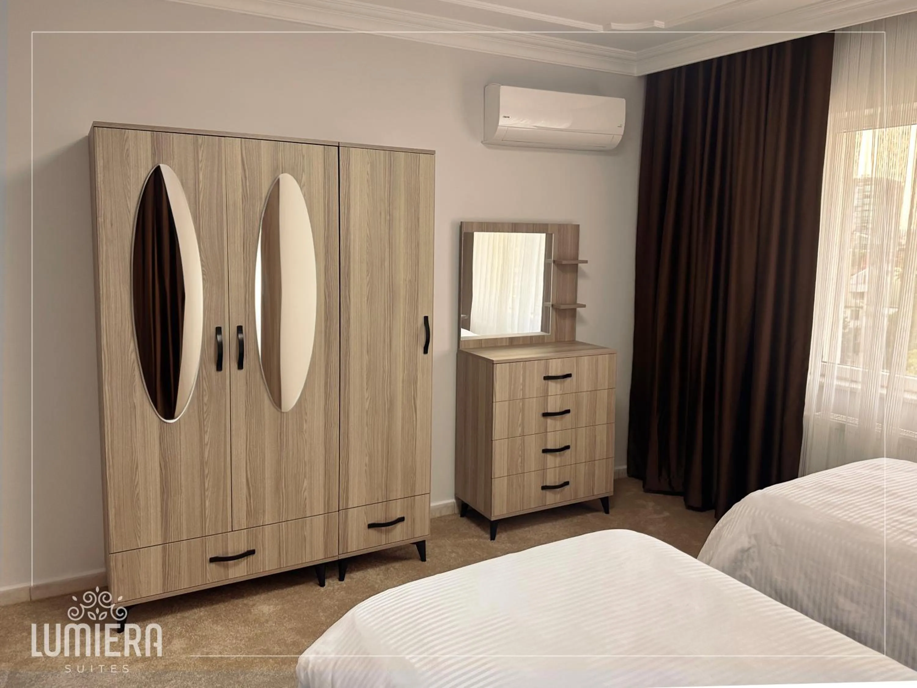 Bedroom, Bed in Lumiera Suites Hotel