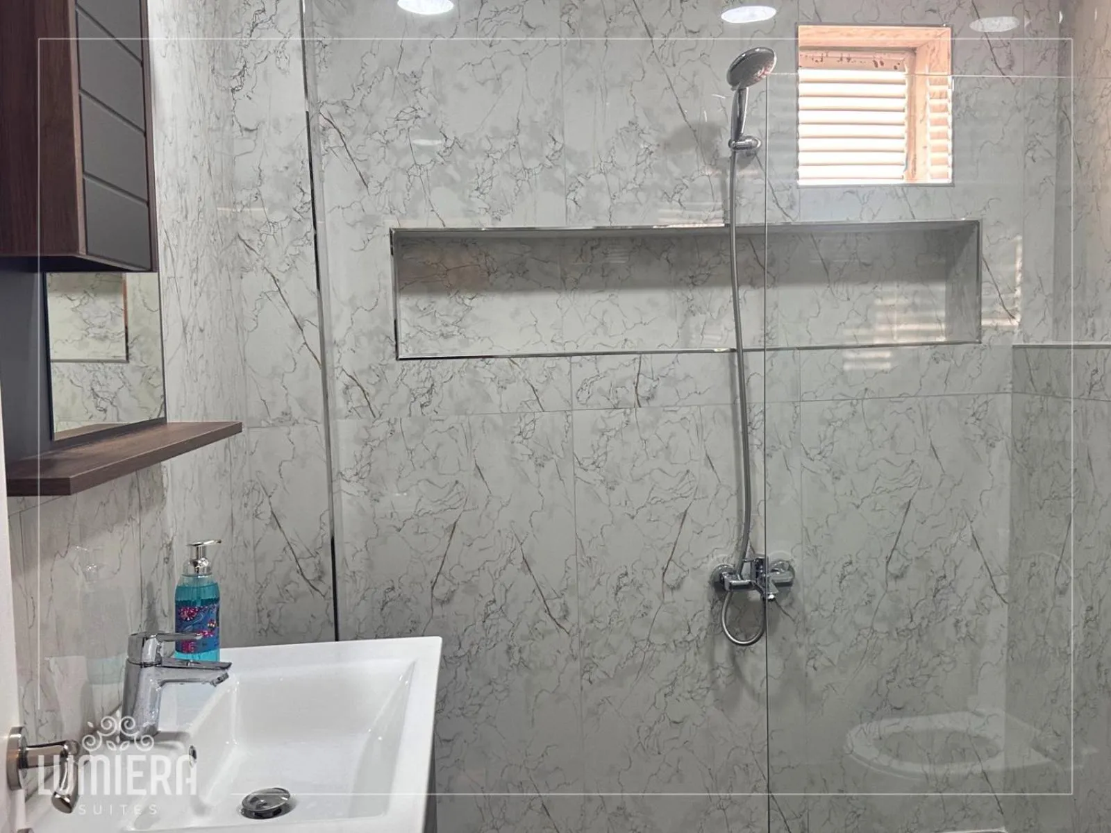 Bathroom in Lumiera Suites Hotel