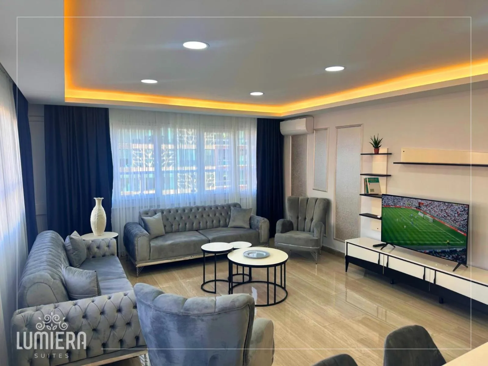 TV and multimedia in Lumiera Suites Hotel