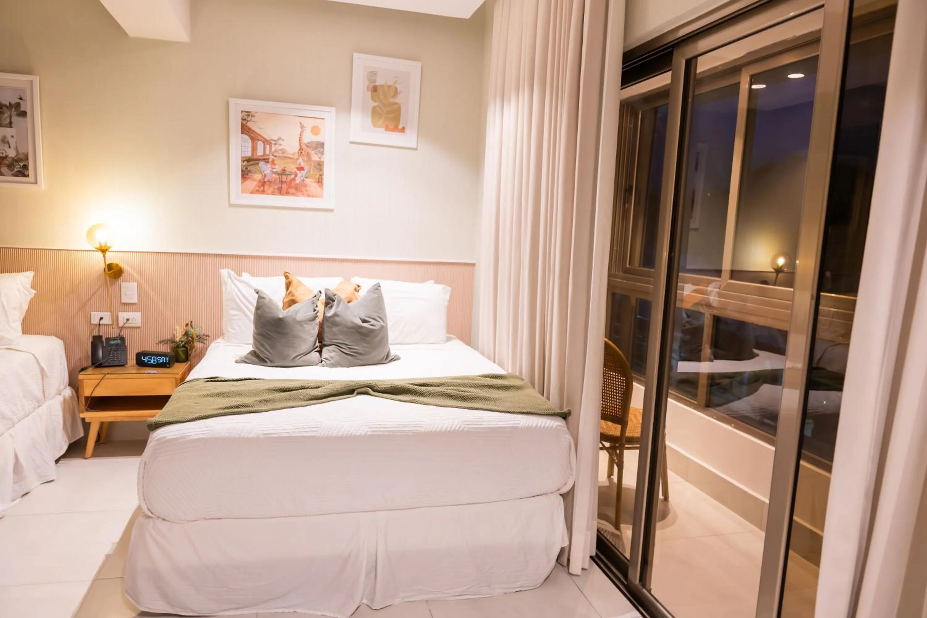 Balcony/Terrace, Bed in Hotel Stay Here Suites