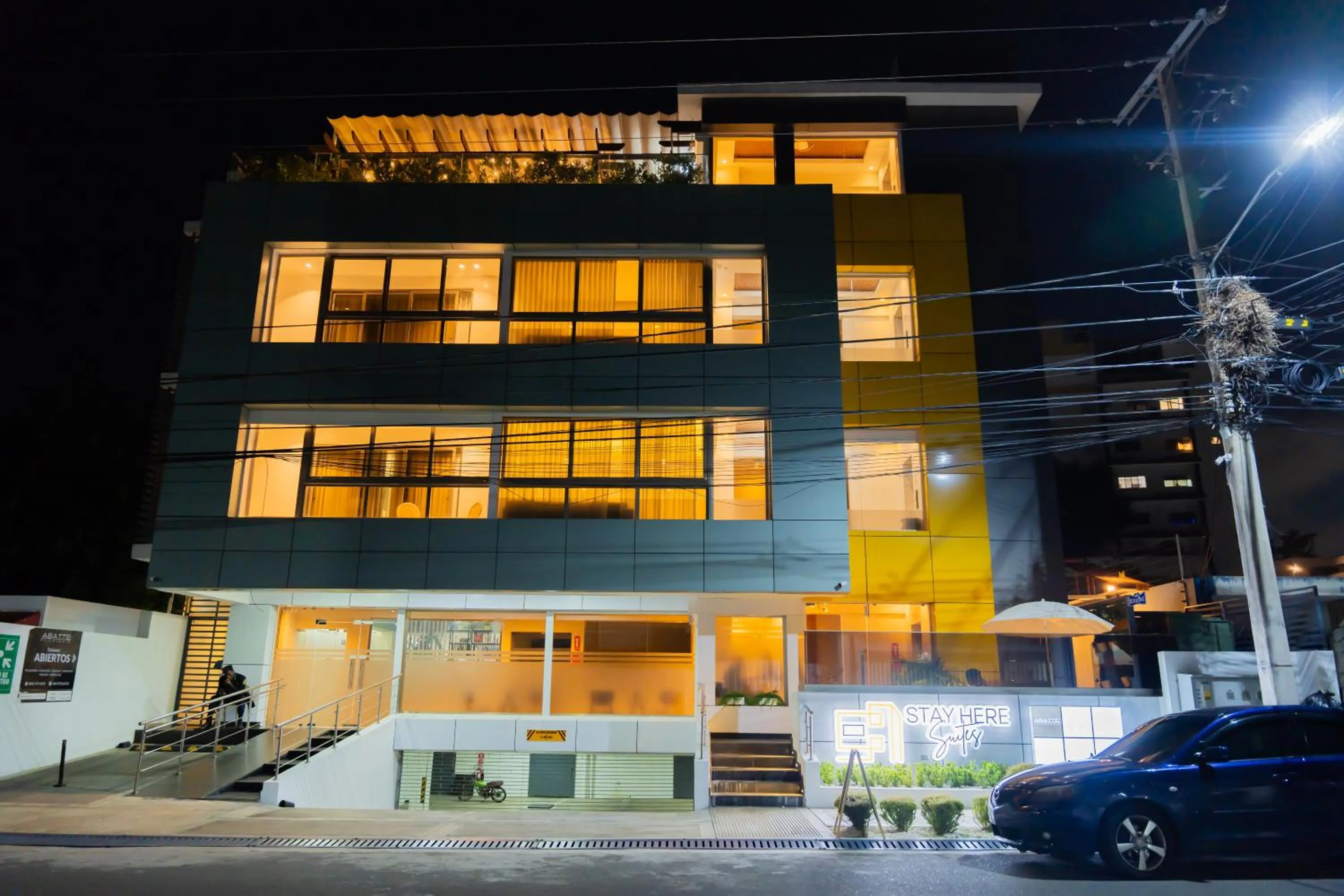 Property building in Hotel Stay Here Suites