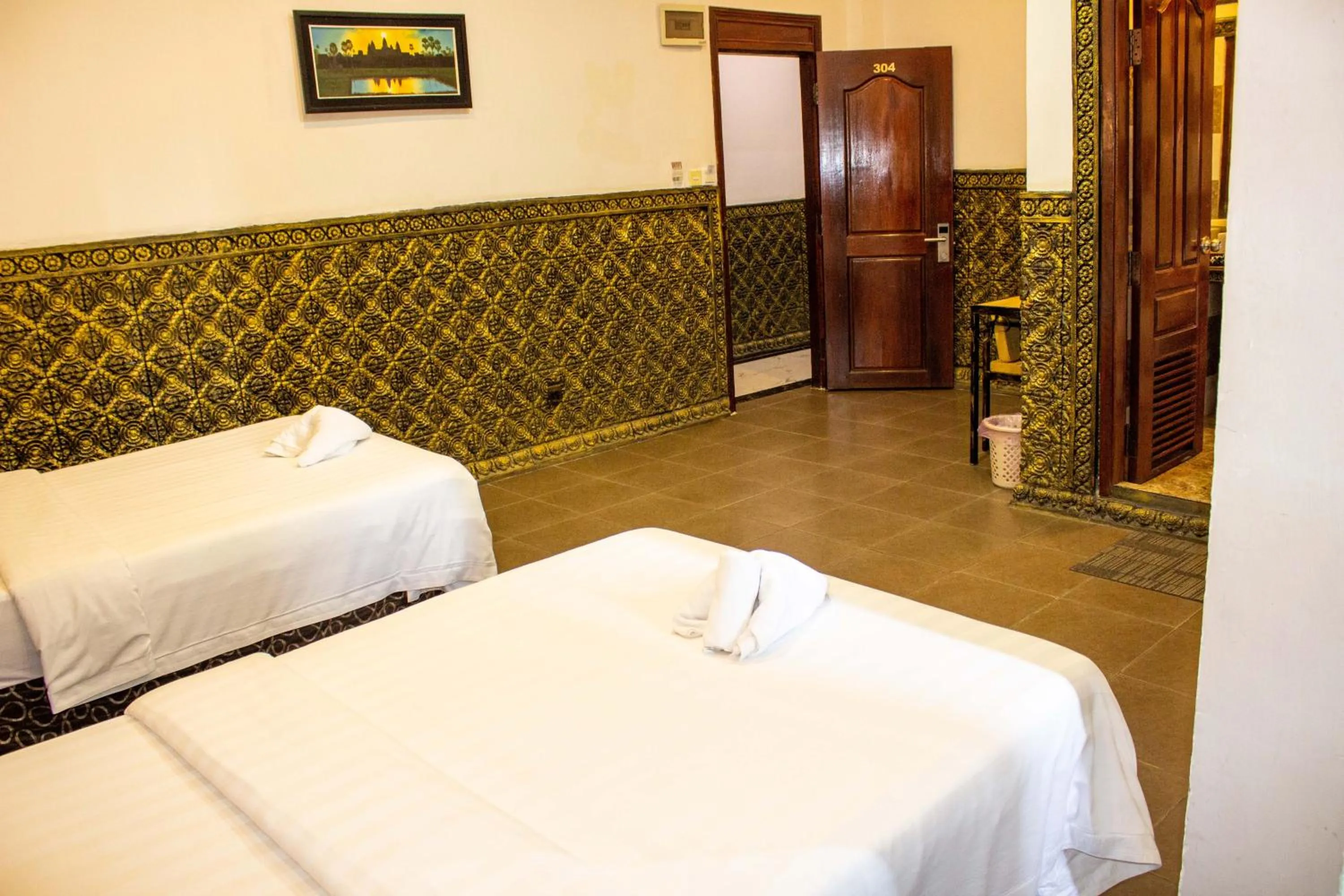 Bed in Le Hotel Hotel Phnom Penh