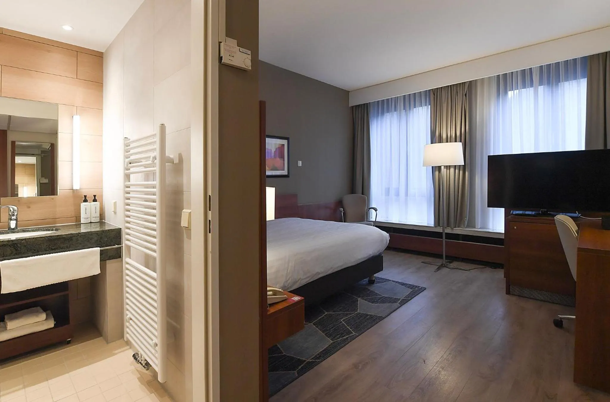Photo of the whole room, Bed in Crowne Plaza Maastricht by IHG