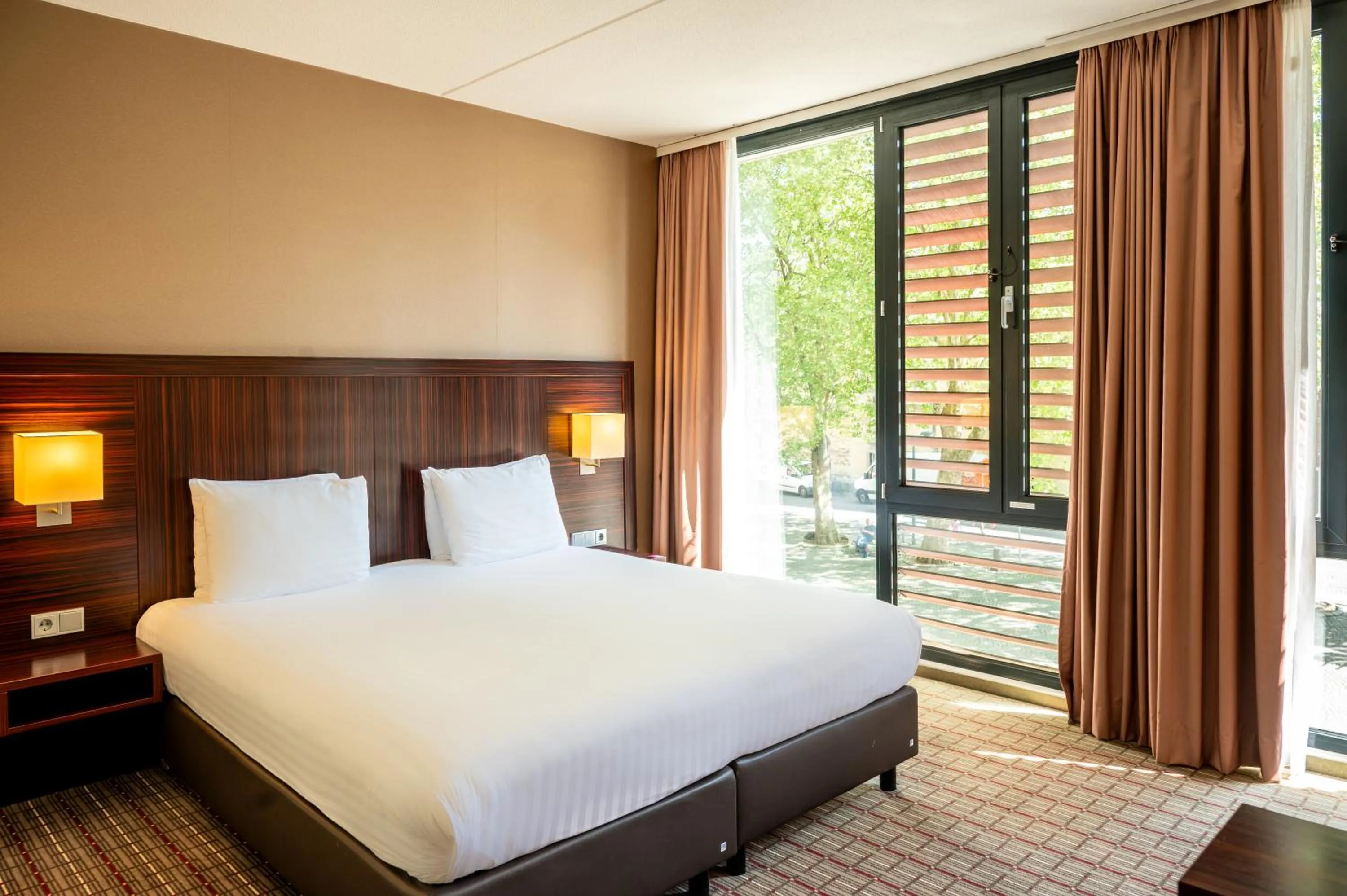 Bed in Crowne Plaza Maastricht by IHG