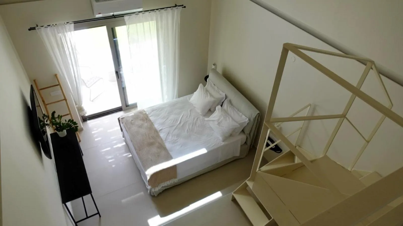 Bed in Pnoe Eco Residences