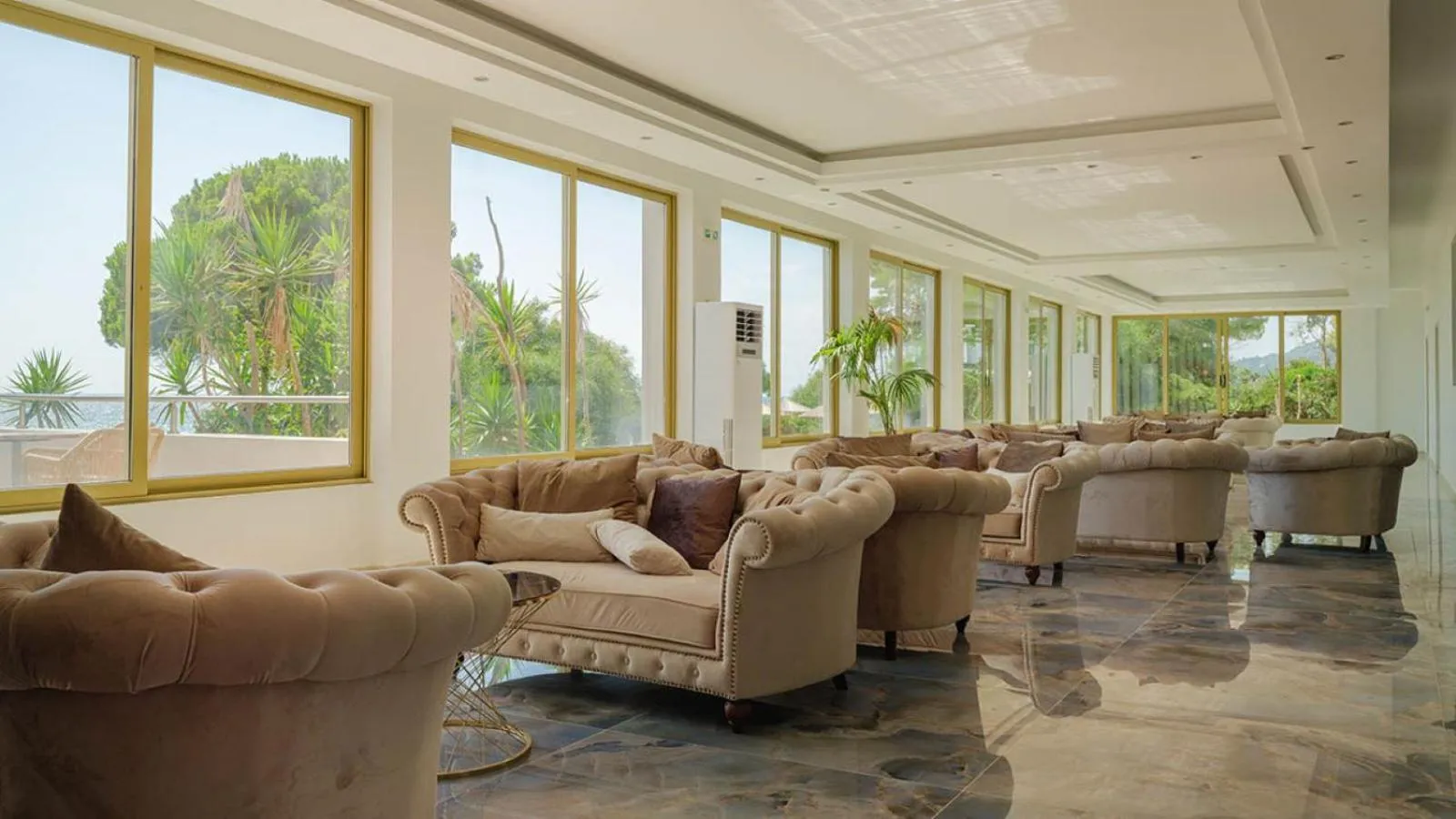 Communal lounge/ TV room in Ninos Grand Beach Resort