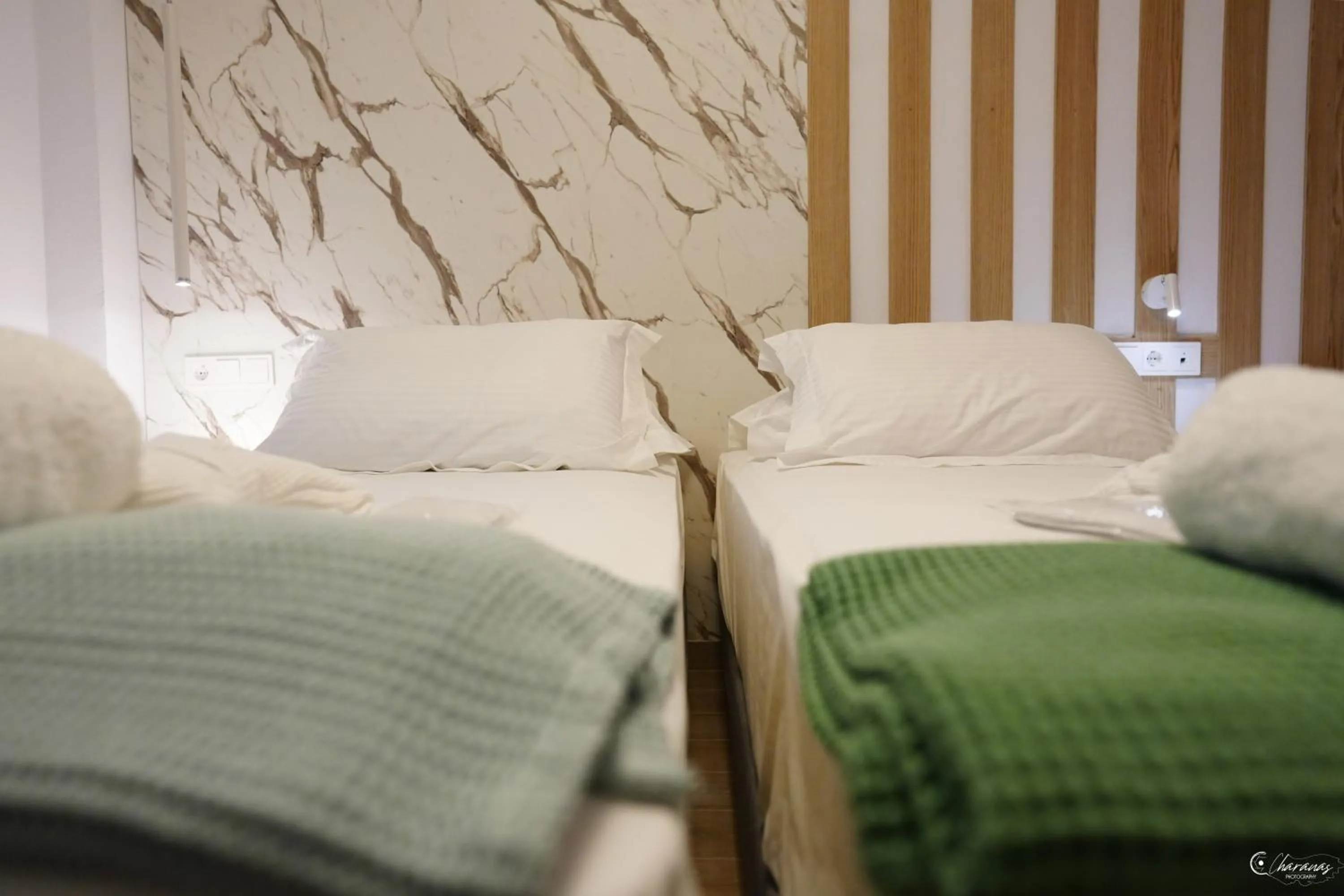 Bed in Electra Suites