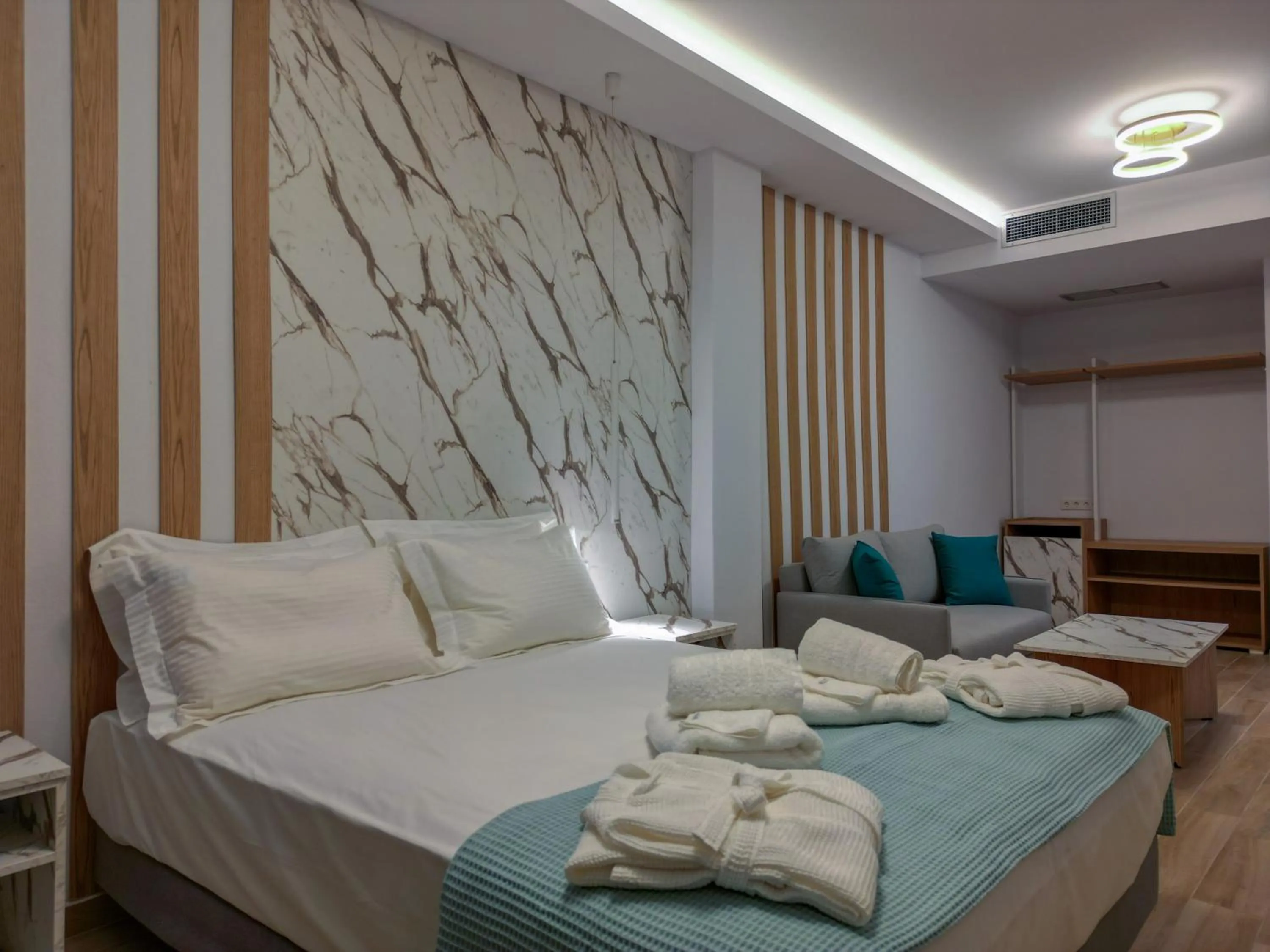 Photo of the whole room, Bed in Electra Suites