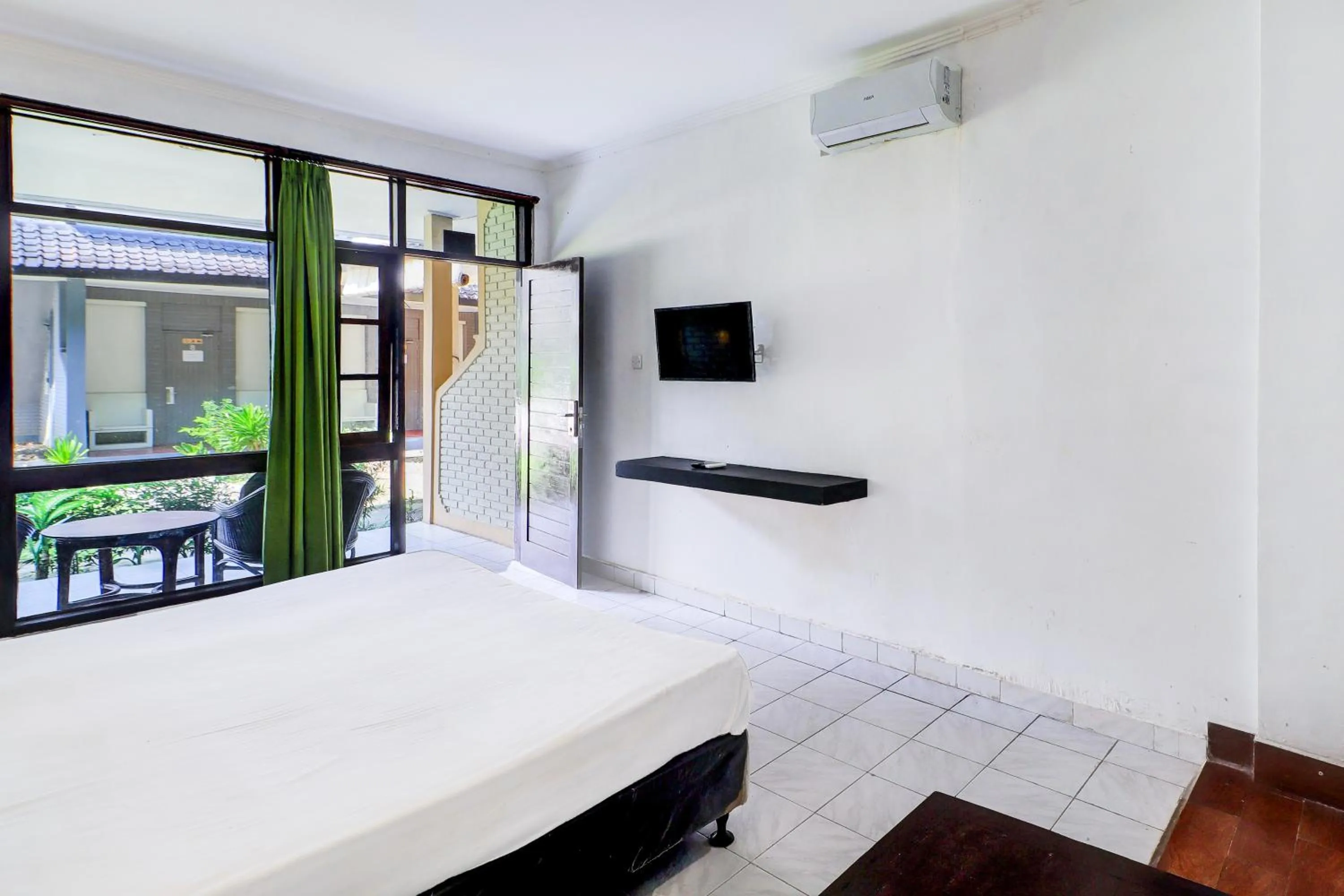 Bedroom, Bed in Super OYO Capital O 93486 Anna Inn Kuta