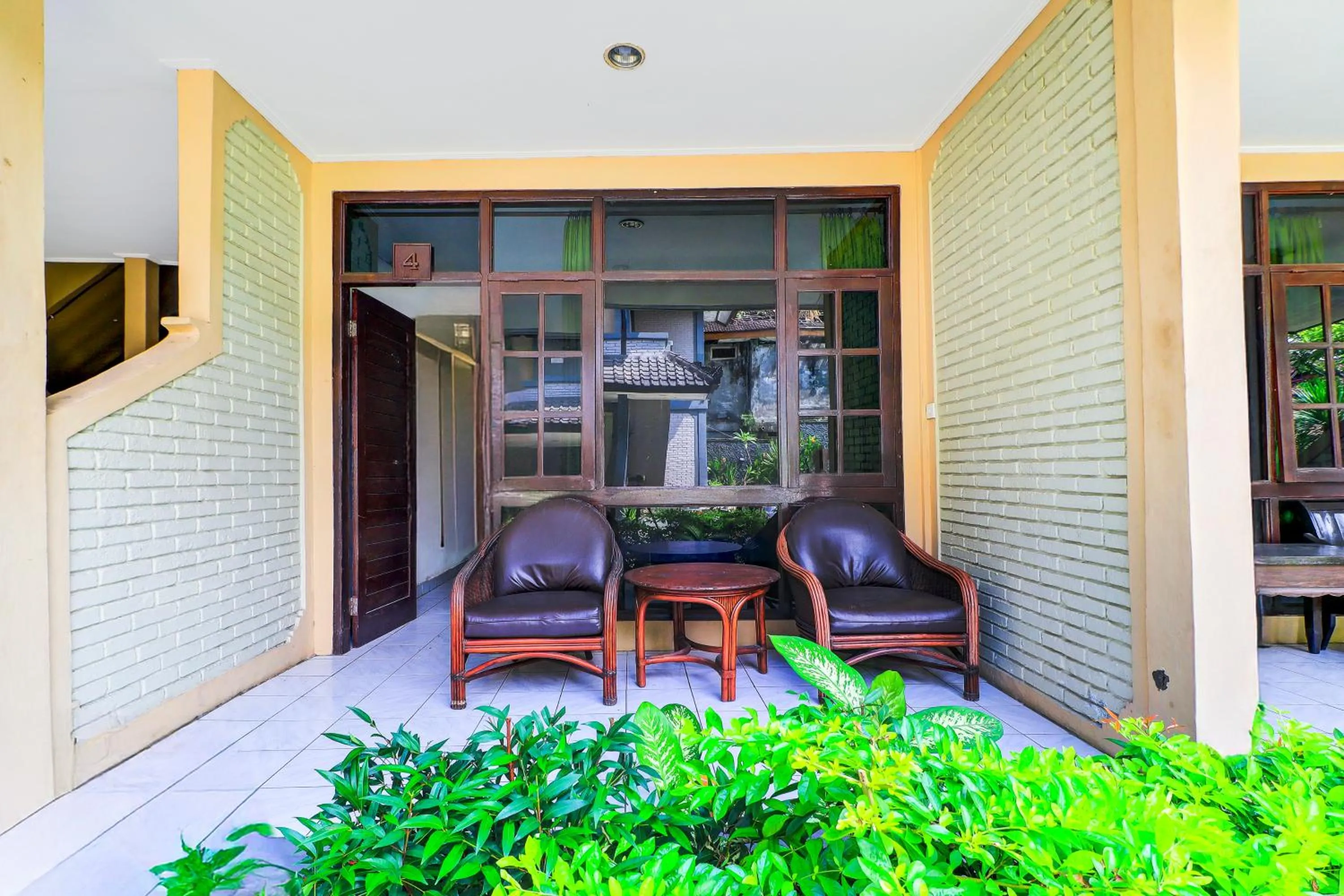 Seating area in Super OYO Capital O 93486 Anna Inn Kuta