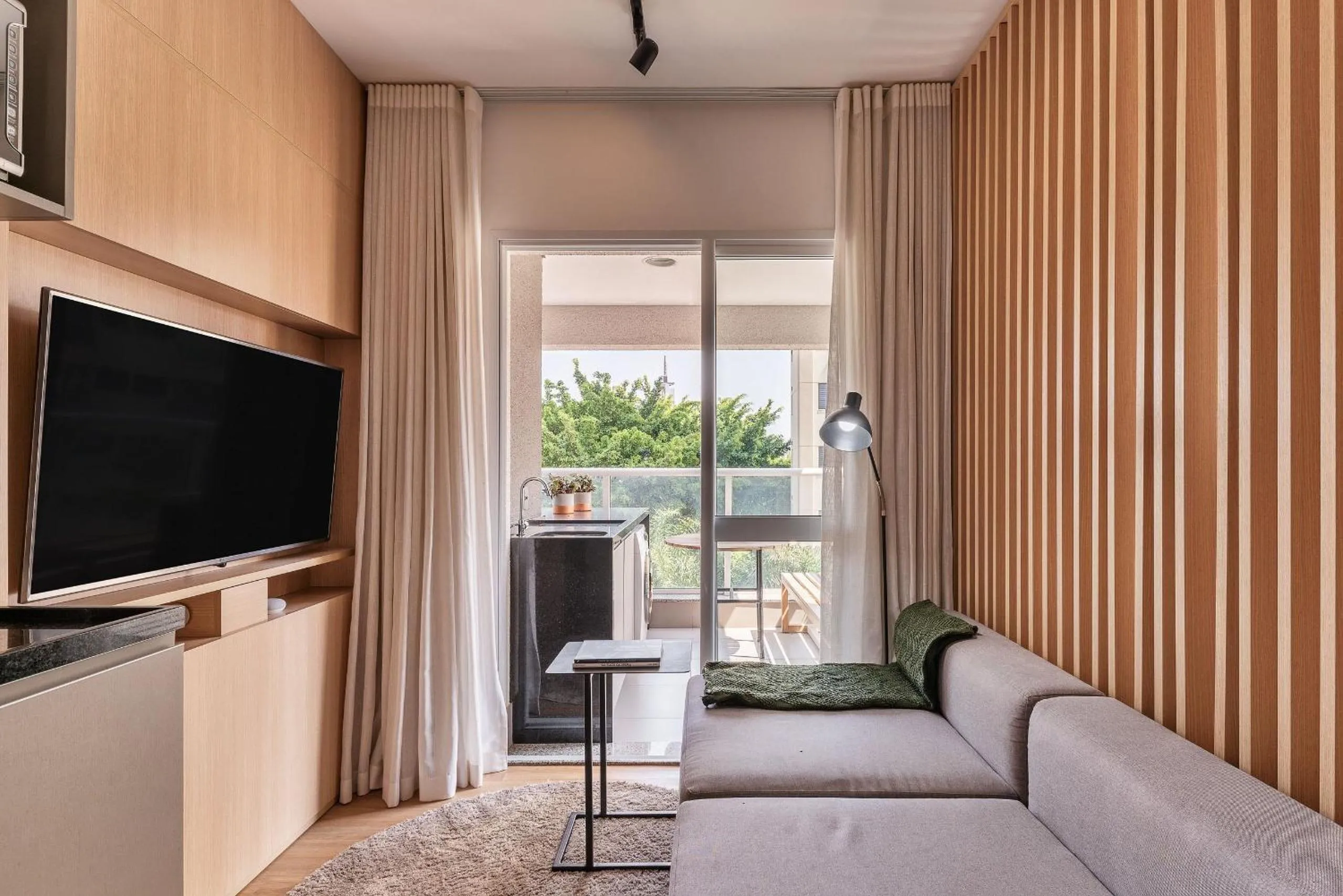 Seating area in Homelike by Viva - Apartamentos completos em Pinheiros a uma quadra da Faria Lima