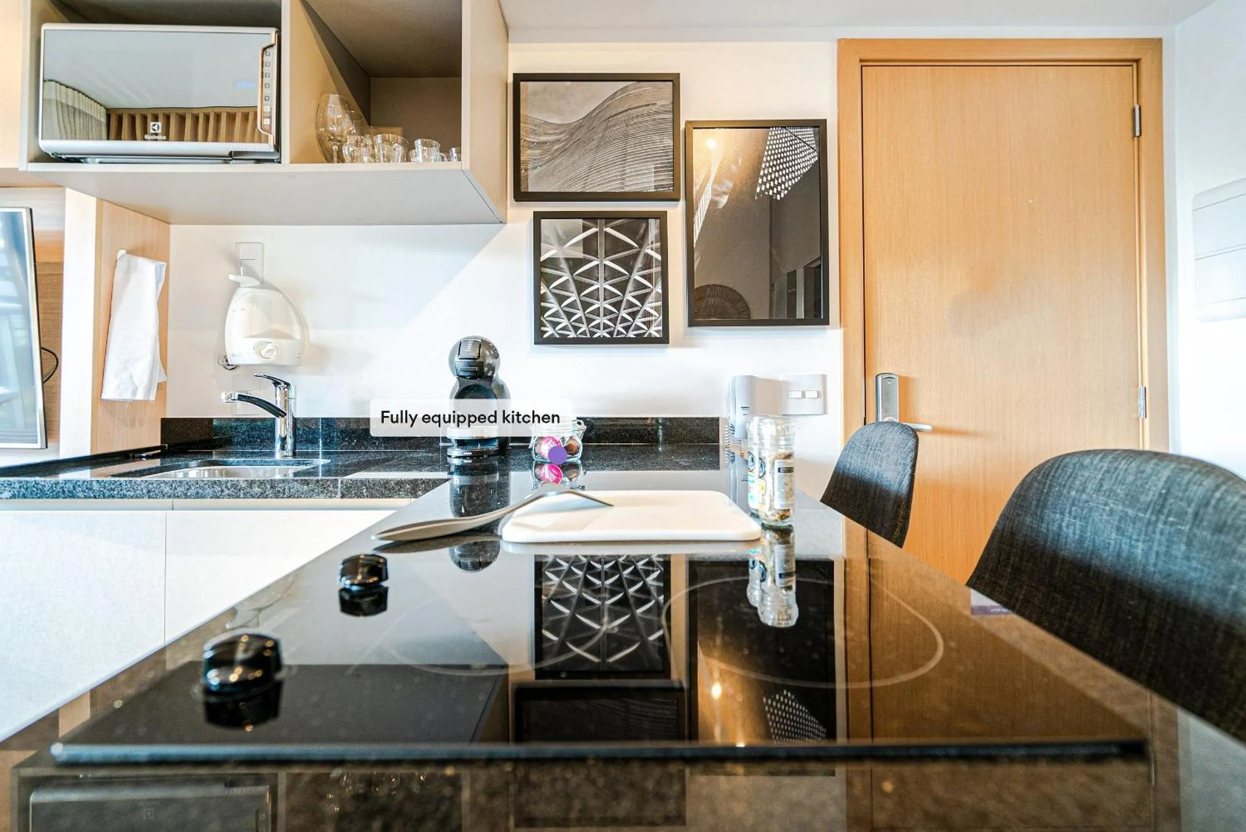 Kitchen or kitchenette in Homelike by Viva - Apartamentos completos em Pinheiros a uma quadra da Faria Lima